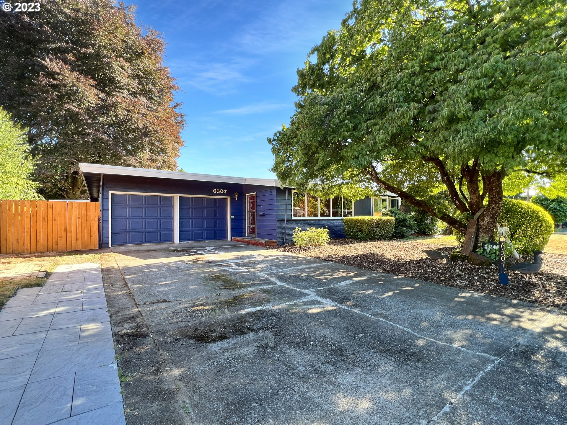 Welcome to this 1954 mid-century modern style home nestled in the Hazel Dell area of Vancouver, WA. This charming property offers an array of possibilities and awaits your personal touch to transform it into the home of your dreams. With vaulted ceilings throughout, this residence exudes a sense of space and comfort. Although the house may need some updating, it provides a solid foundation to work with and presents an excellent opportunity for those seeking to add their own personal flair. The original hardwood floors showcase the character of the era and are ready to be revived to their former glory. The backyard boasts a covered patio and a convenient storage/tool shed, providing ample space for all your outdoor equipment, gardening tools, and more. Additionally, the property includes an office-type room inside, allowing you to establish a dedicated workspace or a cozy den for leisurely pursuits. The freshly painted exterior enhances the curb appeal and sets a welcoming tone for visitors. The large corner lot not only provides ample space for outdoor activities but also offers potential for landscaping enthusiasts to design their own picturesque garden. Location-wise, this home has it all. With proximity to schools, shopping centers, parks, and entertainment options, you'll have everything you need within reach. Commuters will appreciate the ease of access to major highways and public transportation, making daily travel a breeze. Embrace the opportunity to make this house your own, infusing it with your style and preferences. Whether you're looking to modernize its interior or simply personalize each room to reflect your tastes, this property presents a blank canvas to work with. Homes in this neighborhood go quickly, and this one is no exception. Schedule a viewing today to explore the potential this mid-century gem holds and envision the possibilities for your future home. The canvas is ready, and the choice is yours - make this house your forever home!