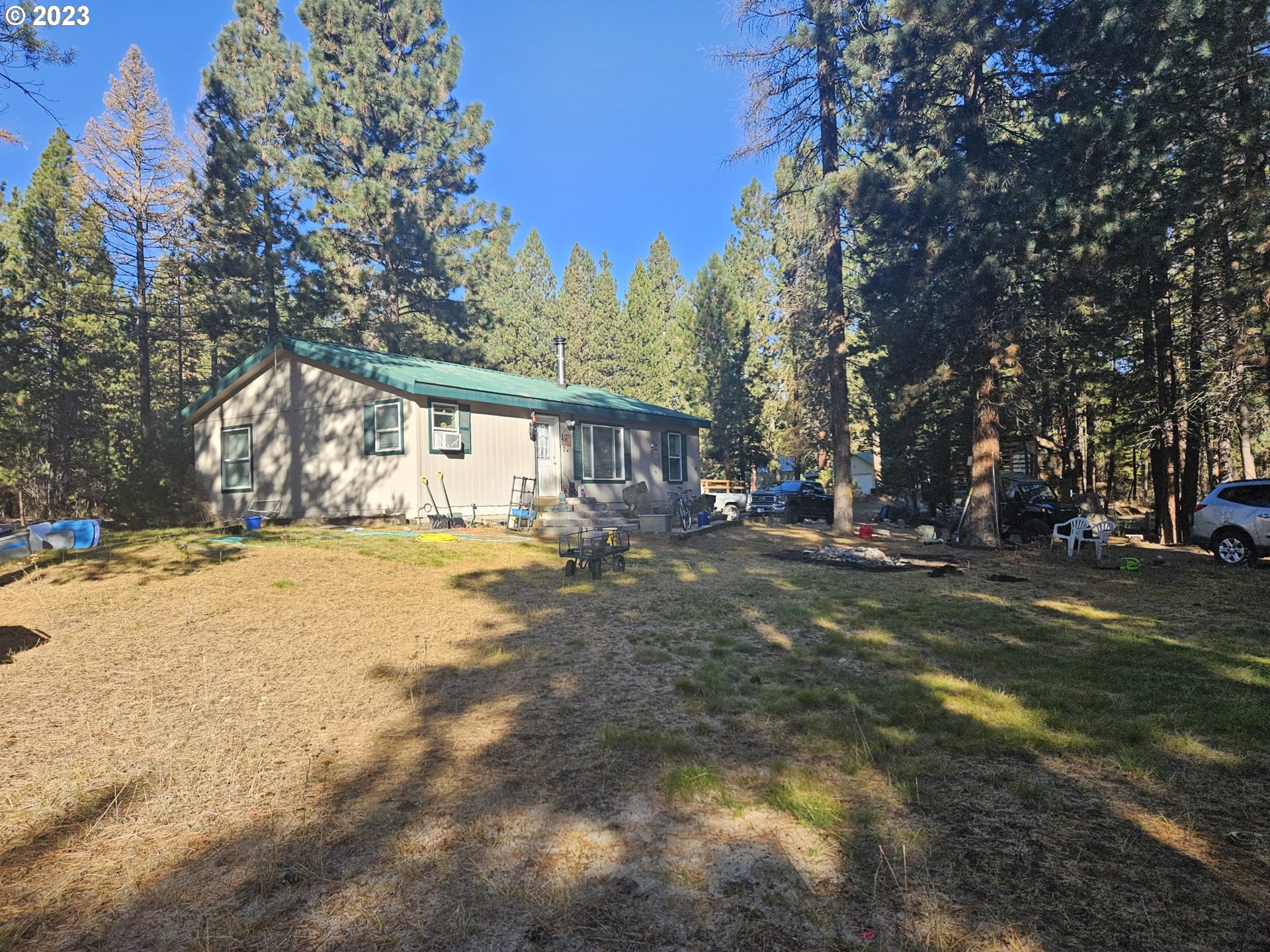 Small 3bed 2 bath manufactured home that sits above the road on 0.94-acre lot with a 36x40 SQFT shop with a graveled floor that has 14ft walls for all of your winter / summer projects. Property is in a nice, wooded area and not far off the highway for easy access. This is a must-see property.