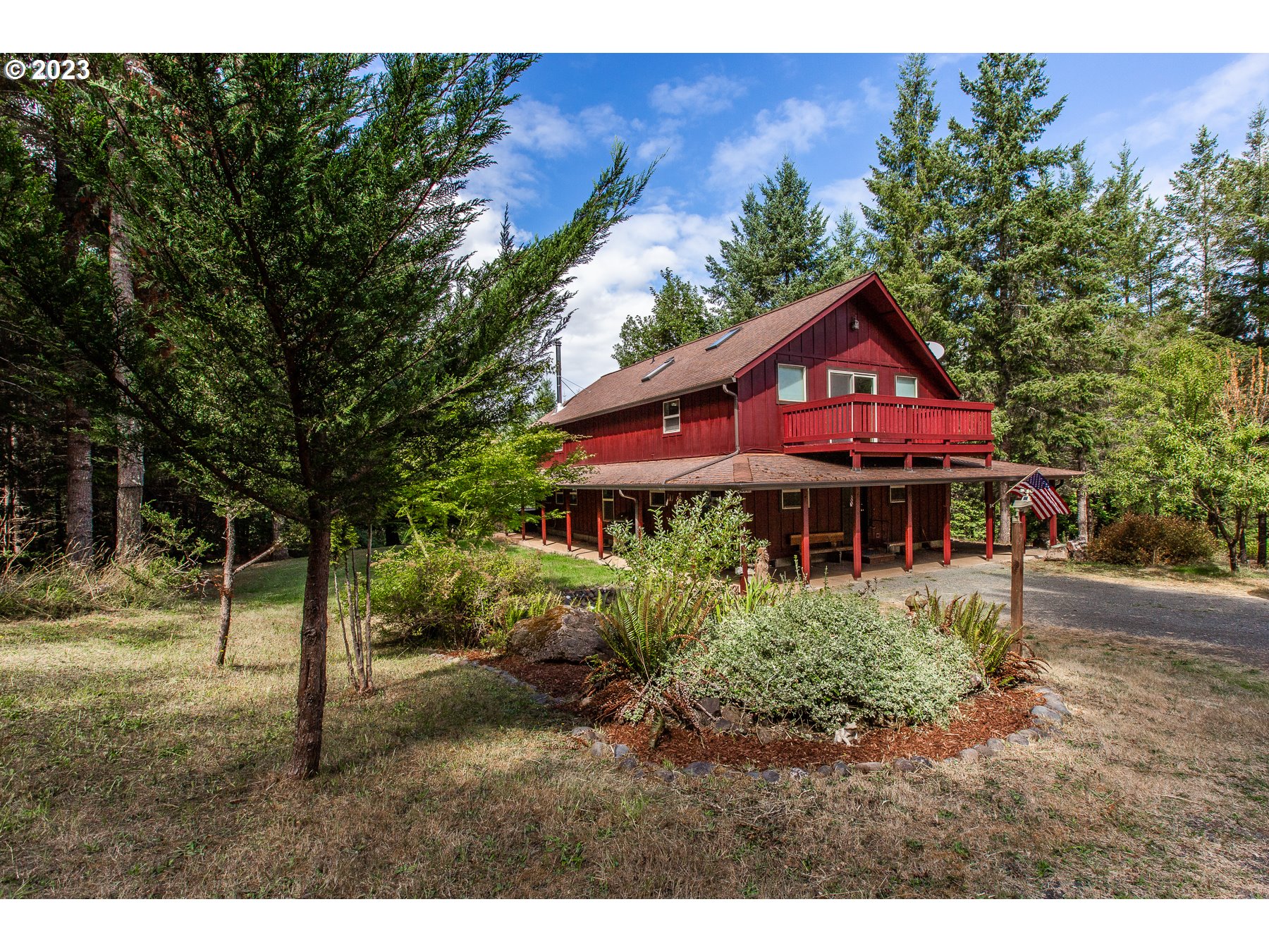 NEW IMPROVED PRICE!!! This property is your very own private lodge with so many amenities! Featuring a 2000 built home with a wrap around porch, hot tub, fruit trees, water feature, gazebo and panoramic views! Inside you will find vaulted ceilings, new flooring, ductless heat pump, an open floor plan, large kitchen with pantry, lots of counter top space, new appliances, loads of natural light and a cozy wood burning stove. Upstairs there is a large primary suite with vaulted ceilings, skylights, ceiling fans, dual closets, private balcony, en-suite, built ins and a loft. This property comes with over 44 acres of land in between the Coastal Fork of the Willamette river and backing up to BLM land with densely planted mature Douglas Fir timber. There is an abundance of wildlife including elk, deer, and turkey. This property qualifies for LOP hunting tags and you can fish from your own riverbank! There are two large shops with over 3,000 square feet of space spreading over 5 bays, with room for 10 or more cars/trucks. There is plenty of heavy equipment or RV storage, 220 volts in each along with working space. This property has endless possibilities to it, is move in ready and waiting for you.