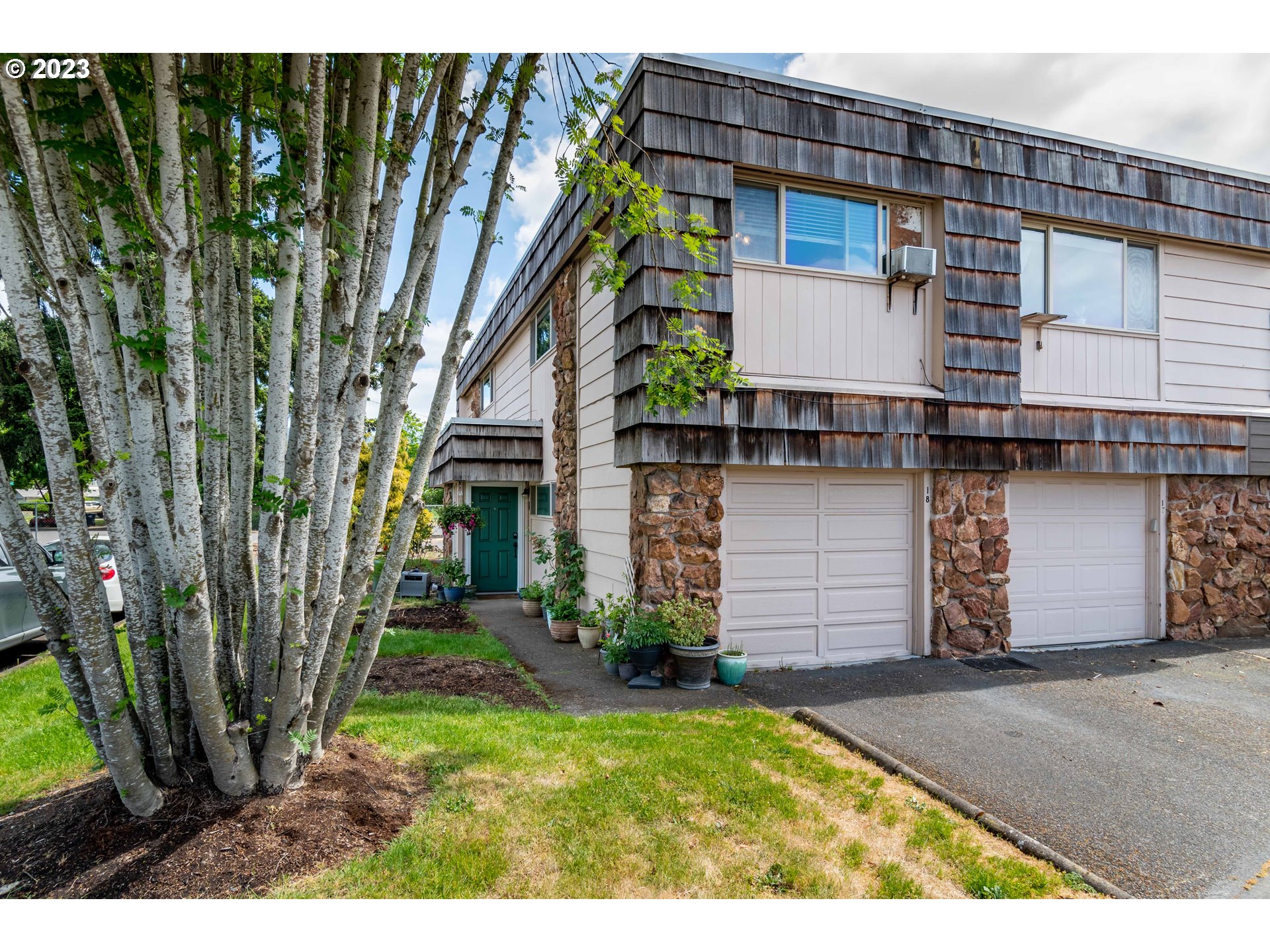 2727 Gateway ST 18 Springfield, Oregon Welcome to this charming condo located in the heart of Springfield! Situated across the street from a plethora of restaurants, shopping destinations, and entertainment options, this well-appointed residence offers the ultimate convenience and comfort. As you step inside you?ll immediately notice the recent updates that have transformed this condo into a modern oasis. Walk up the custom wood paneled stairs to enjoy fresh paint throughout, and a beautifully renovated bathroom featuring a tile to ceiling shower that enhances both style and functionality of the space. Enjoy two nice sized bedrooms completed with new carpet and trendy barn doors to keep your belongings tucked away in the closets. The main living space boasts a seamless flow connecting the living room, eating area and kitchen complete with new laminate flooring and a newer ductless mini-split for your AC and heating needs. Once in the kitchen notice the modern feel, stainless steel appliances, and subway tile backsplash. The porch area offers a lovely outdoor retreat where you can unwind and enjoy the fresh air, providing an ideal spot for morning coffee or evening relaxation. With a total of 988 square feet, this home strikes the perfect balance between spaciousness and low-maintenance living. Schedule your showing today and experience the perfect blend of comfort, style and convenience that awaits you!