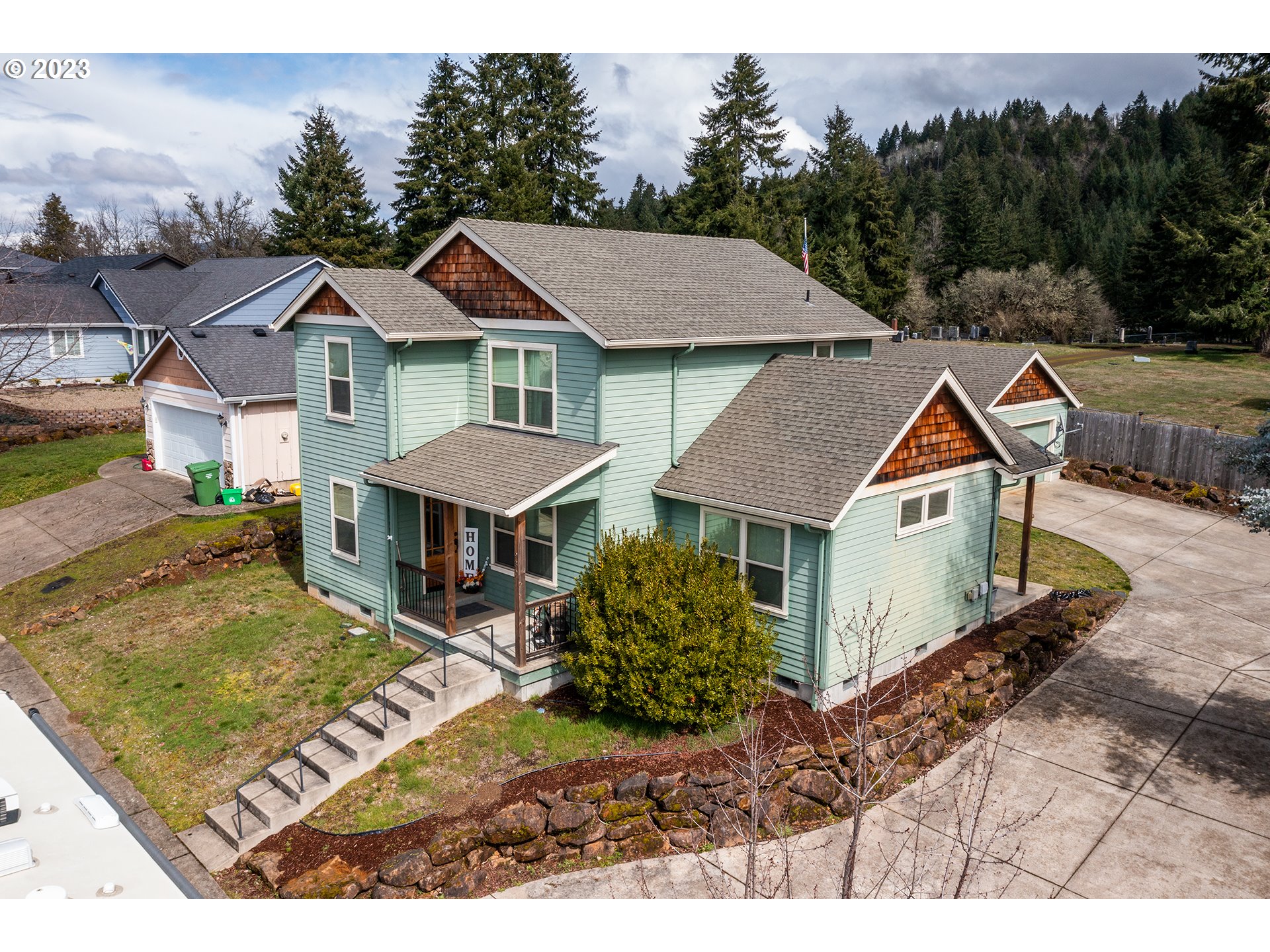 PRICE IMPROVED! A bargain at this price! All new SS kitchen appliances, washer / dryer stay! Seller just had high-end water heater and a charger for your Tesla installed. Take in views of the Cascade Mountain Range from nearly every room of this two-story 2006 built, 1732sqft. 3bd 2.5 bth home. Step inside off the covered porch to a wide-open yet cozy concept made grand feeling by high ceilings throughout. A floorplan that flows seamlessly from dining to living room where vaulted ceilings mimic the mountain views and a slider-door provides easy access to a covered patio over-looking the low maintenance yard at the rear of the home.  The well-appointed, spacious kitchen is equipped with all new Samsung SS appliances, under cabinet lighting illuminates generous counter space, a pass-through window for convenience and connection on game days and holidays alike! A designate indoor laundry room & a stylish powder room round out the main level. Stairs off the foyer lead to the homes 3 bedrooms and  2 full baths. The Owners suite continues the theme of vaulted ceilings and views but also boasts a walk-through his & hers closet leading to en suite w/ dbl vanity & step-in shower. Other home highlights incld. heat pump|A/c, new water heater, lots of storage, covered walkway leading to a finished detached  2 car garage with 50 Amp Electric Vehicle Charger & ample off-street parking. All schools are within 1/2 mile or less!