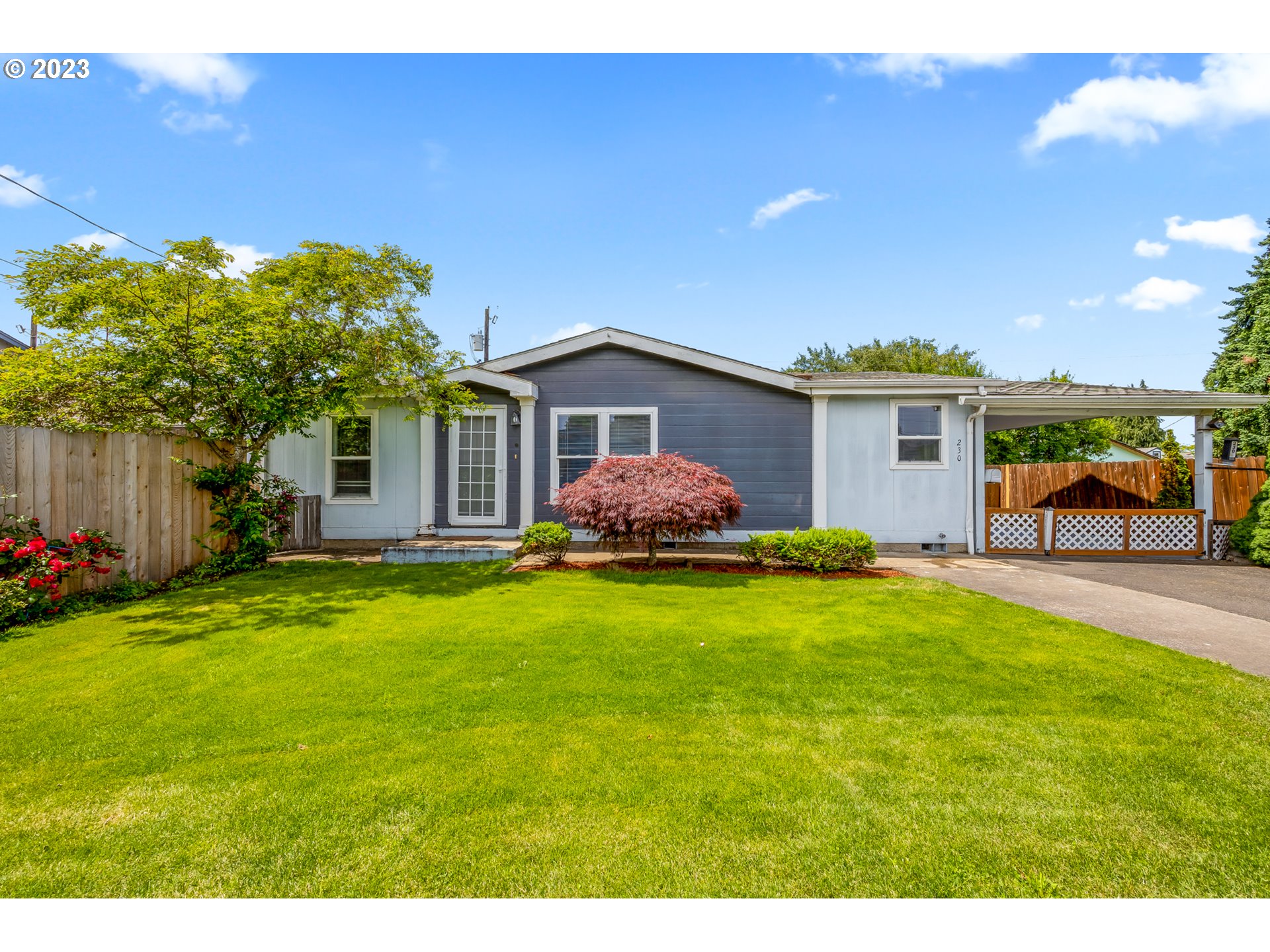 Location, Location, Location! Easy access to shopping and Medical.  River is nearby and the coast is just over an hour drive.  Home has 3 bedrooms and two baths.  Remodeled master bath allows for easy walk in shower.  Flag lot gives additional privacy from the street.  Out back there is a shop, garden sheds, and a man-cave/she-shed.  Established rose bushes and pad for the RV.    There is a covered patio and carport too.  In the past the carport served as a patio.