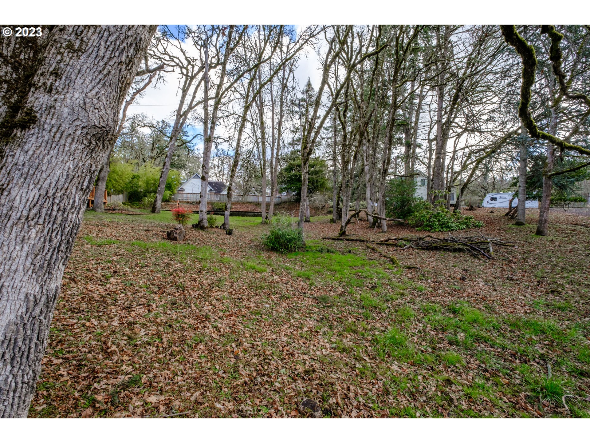 Two adjoining tax-lots totaling over 1/3 acre situated at the end of a road in a low-density neighborhood. Mature trees lend a park-like feel to the gently sloping lot. Utilities are ready to connect, making it easy to create your dream home or investment property in this prime Eugene location. Lot has been surveyed and marked. Enjoy quick access to I-5, University of Oregon, and city attractions.