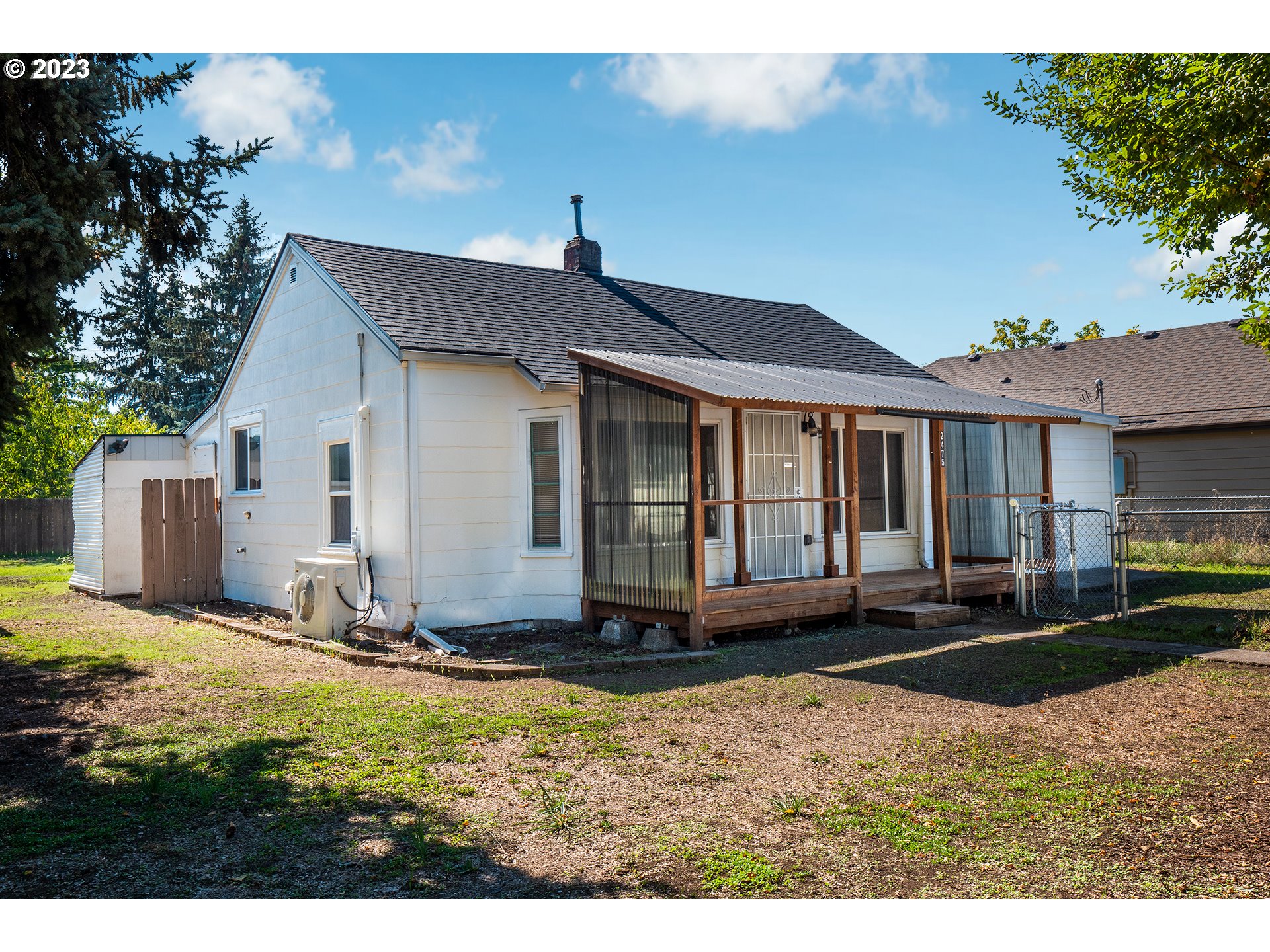 Very rare find for a house of this type including a NEW MAIN ROOF, central location, and huge lot size at this price with the potential opportunity for sweat equity! Other features include a covered front porch, vinyl windows, and a converted garage with the potential for 2 more bedrooms (not currently counted in the RMLS finished square footage or bedroom count). Selling AS-IS for Seller convenience. Seller will consider a financed offer, would be at the Buyer's expense to make the property financeable if required by lender. Potential offers will be reviewed following the weekend and will be responded to by the end of the day on Monday. Seller retains the option to accept anytime. Listing Realtor is a Seller. Schedule an appointment to view!
