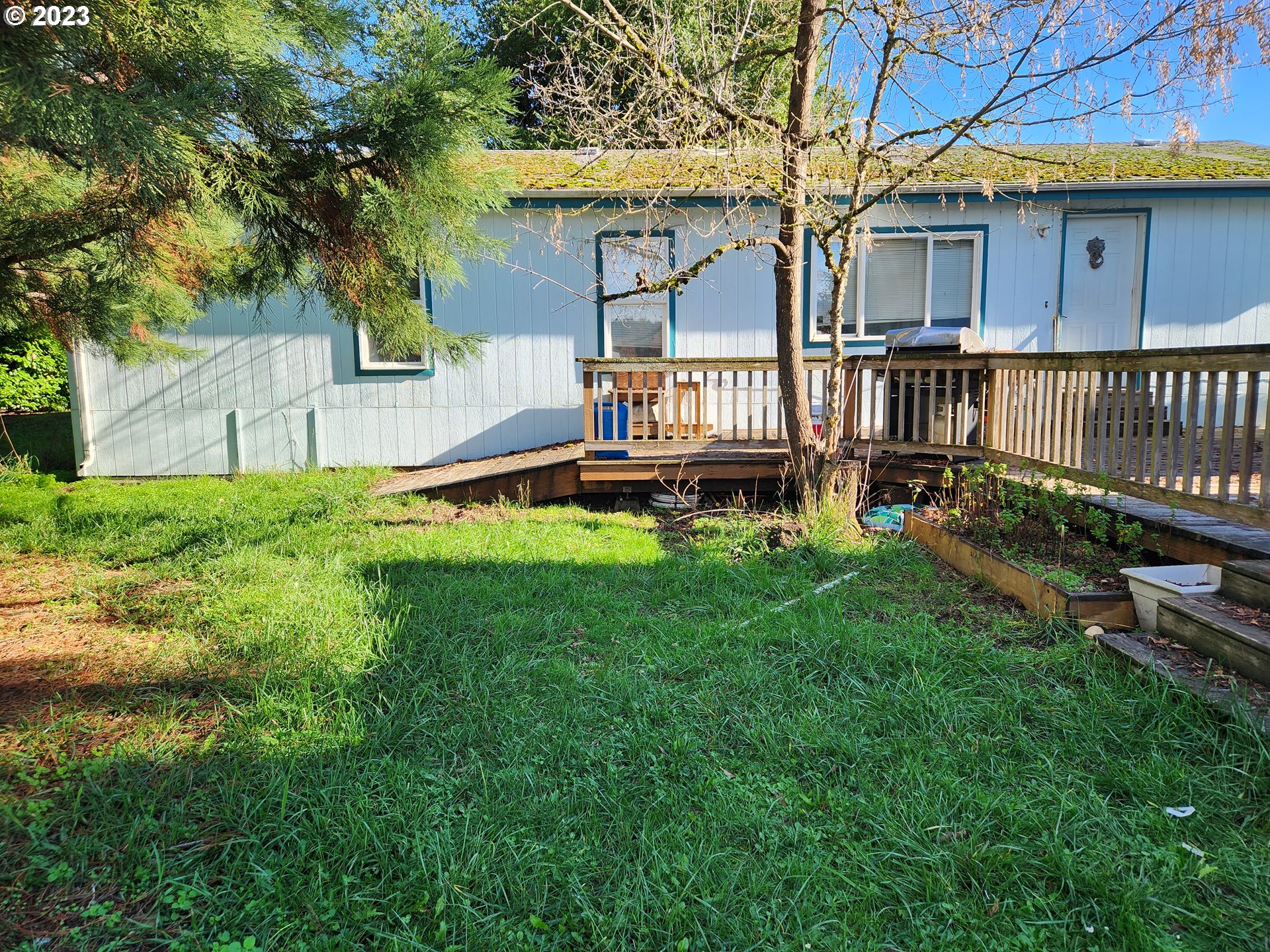 1241 S 4TH ST Cottage Grove, Oregon Potential investment opportunity awaiting. One level manufactured home on 0.17 acres. Sold "As-Is". School just a few doors down. Minutes away from the freeway. This home is tucked away from the street with majestic pine trees providing plenty of shade all day. The deck provides opportunities to relax and access to the two outbuildings. Centrally located between Eugene, Roseburg and the Oregon Coast.