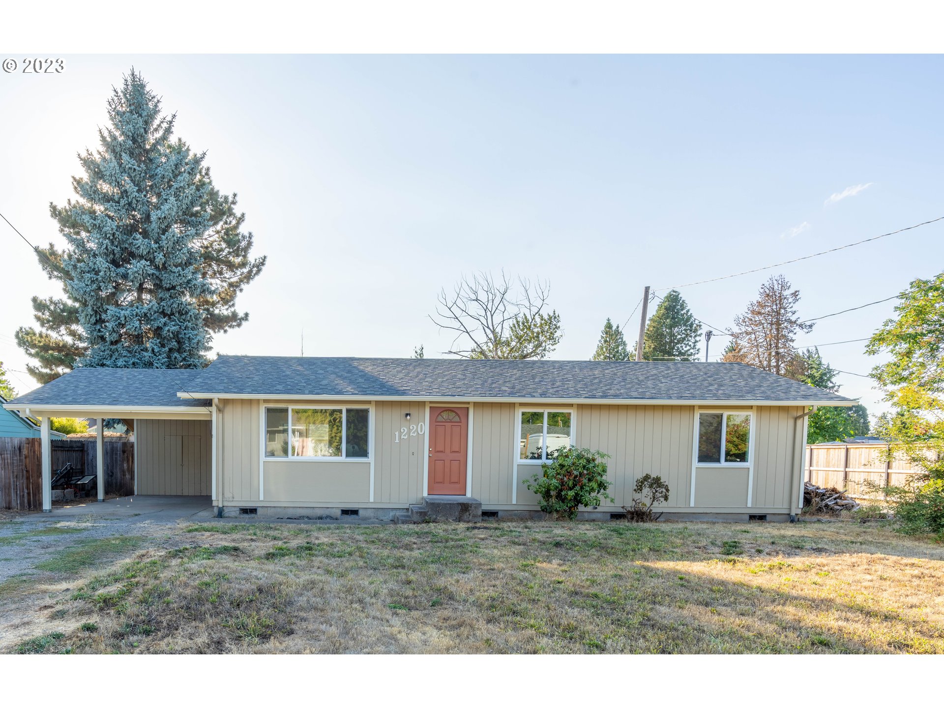 Great starter home! This move-in ready home is located on a quiet dead end street in close proximity to Petersen Park & Petersen Barn Community Center. Updated features of this cozy 3 bedroom, 1 bathroom home include, laminate wood flooring, carpet in bedrooms, baseboard heaters, modern bathroom with tile floor, fresh interior and exterior paint, butcher block kitchen counters, dishwasher, range, built-in microwave, light fixtures, and water heater. New insulation and vapor barrier in crawl space. Carport with storage, large fenced backyard and double pane vinyl windows.