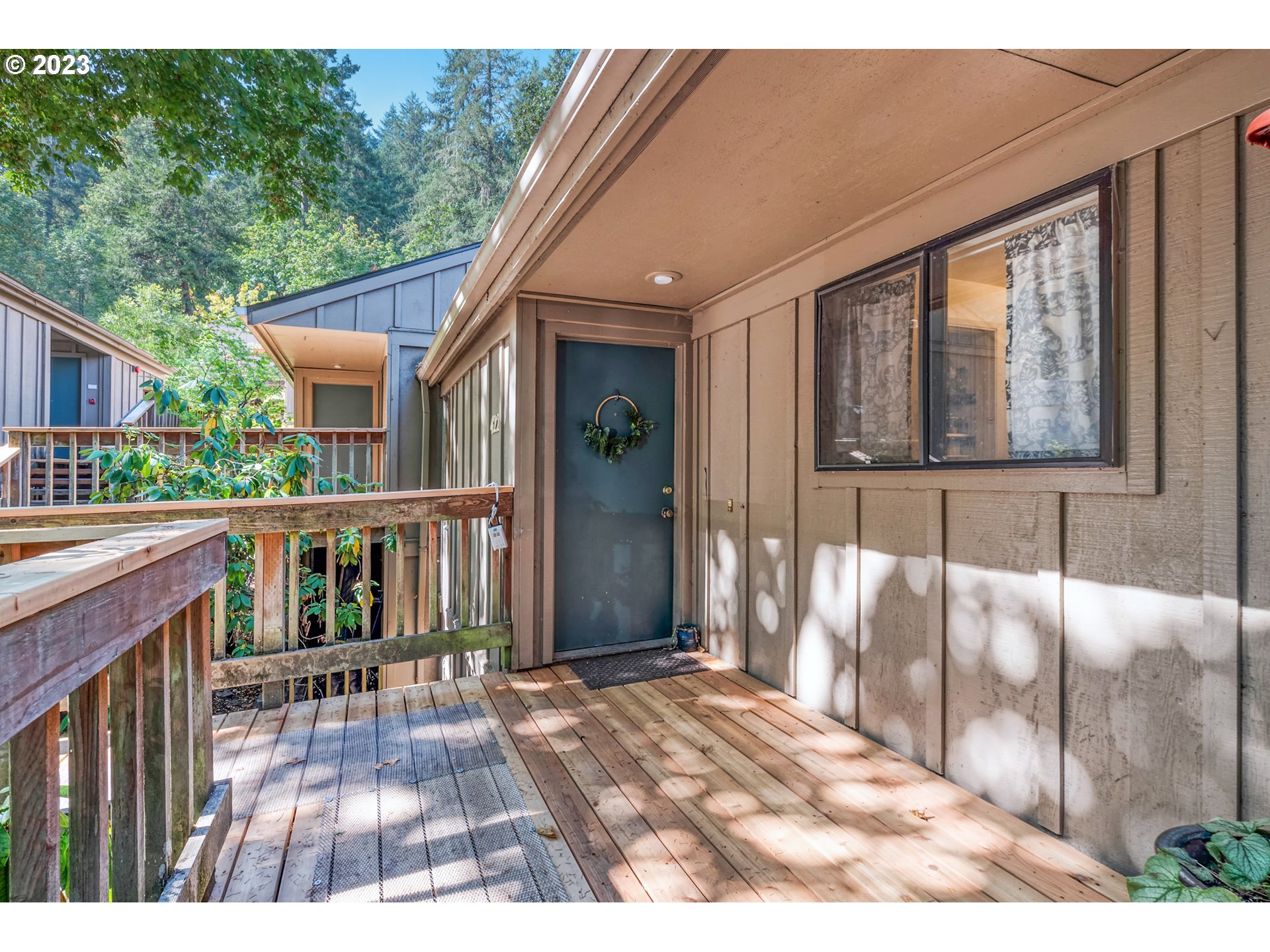 Discover charm in this park-like condo with vaulted ceilings, bamboo floors, and a cozy fireplace. Enjoy the balcony overlooking nature. Storage space has the opportunity to become a private laundry area. Community perks include a pool, rec room, hot tub, and clubhouse. HOA covers water, sewer, garbage. Convenient to Ridgeline Trail and bus line. Add a separate garage for $10,000. Embrace the perfect blend of comfort, privacy and convenience.