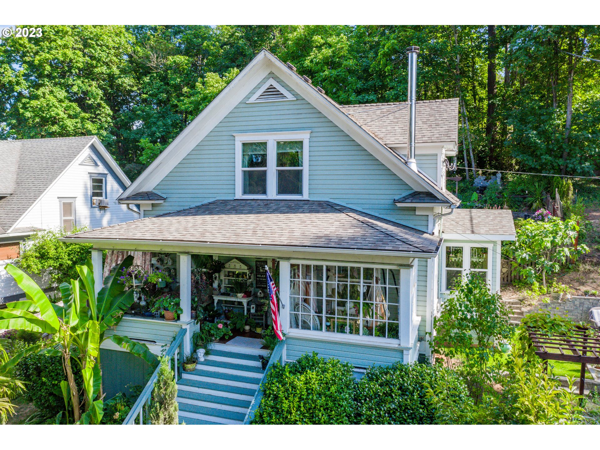 Enjoy the quiet neighborhood while you soak up the vintage charm of this Craftsman style home, built in 1907. With its 2012 head-to-toe remodel, this home is the best of both worlds, old and new. This included new plumbing, new electrical, and a new kitchen with granite counters. All three bedrooms have walk-in closets. Located a block from downtown and around the corner from the exquisite Pioneer Park, this may just be the best location in Brownsville. The full finished basement offers plenty of storage and shop space. The fenced grounds are your own private woods and include a finished cottage that would make a wonderful office, home gym, or art studio, plus there's RV parking and a roomy driveway. Cozy up next to the new wood burning stove or settle into the backyard patio on the nicer days. This home is truly special and will sell quickly, so schedule your showing right away!
