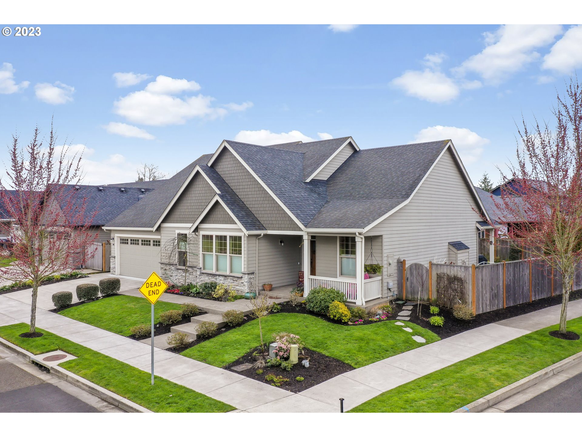 Style and practicality unite with this beautiful open concept 3 bed, 2 bath, den/office, over 2,000 sq/ft home. Located in desired Hayden Bridge neighborhood, this home offers plenty of space to host gatherings. Showcasing a 3 car garage, loads of storage, an office/den, a fireplace, and a large and open living room/kitchen. Enjoy warm summer days on a covered patio while viewing fruit + flowers in the well-manicured backyard of this dreamy home. A greenbelt is across the street and a bike path is located steps from this home. BBQ gas hook up in the back. Back-up generator hookup in garage. Energy star appliances and more!