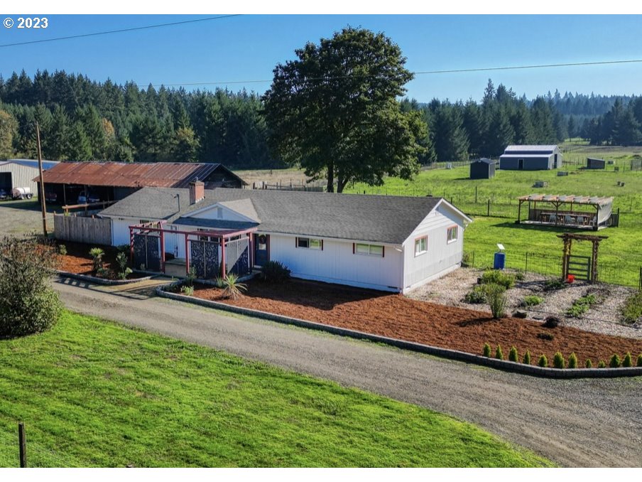 Tastefully updated home with a modern Farmhouse feel in a 1920 sqft 3-4 bed 1.5 bath ranch style home located on just under 40 acres.  Acreage contains a blend of pasture land, woodland and wetlands, seasonal pond and streams on a mostly level lot located within minutes of Veneta and 20 mins to downtown Eugene. Front Barn with 2 horse stalls and a tack room, a 44x32 metal barn, lean-to, and numerous other outbuildings.  All ready for livestock with fencing and cross fencing set up for rotational grazing. Extensive garden area currently set up for growing flowers and a separate area for veggies.  Using the lands resources there are 17,500 gallons of rainwater storage.  A number of seating areas to enjoy the various aspects of the garden and property. 2 50 amp RV outlets. Separate 2500 gallon water storage tank with pump for RV hookup. The home was remodeled down to the sheetrock less than 4 years ago, all vinyl windows, ductless heating and cooling, roof is 5 years old, a large solar system installed, Luxury vinyl plank floors throughout, quartz counter tops, stainless steal appliances, pellet stove, very light and bright. A must see to fully appreciate all the beauty and tranquility this property has to offer. 20k contribution towards rate buy down.