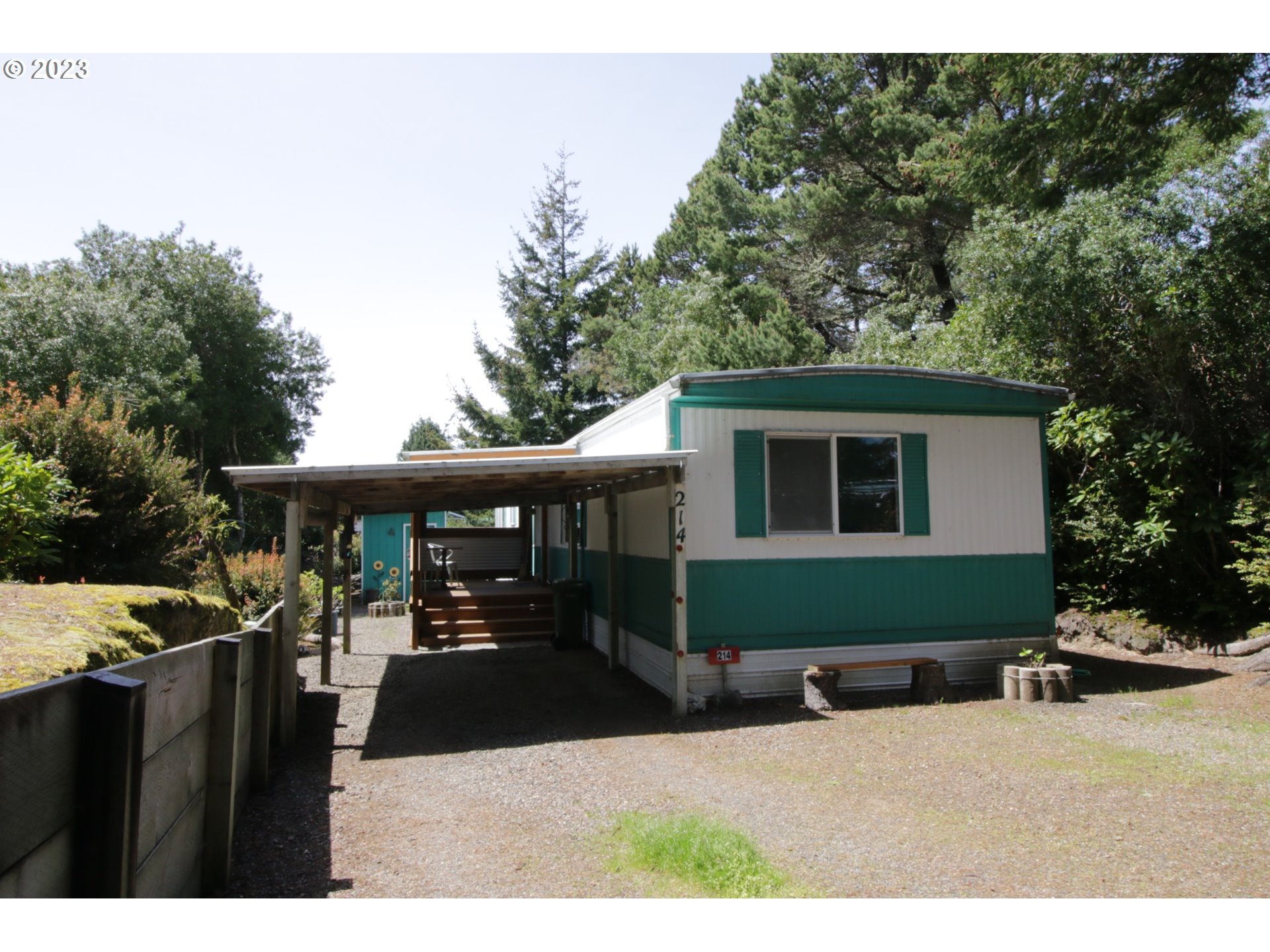1600 RHODODENDRON DR 214 Florence, Oregon Enjoy all the amenities of Greentrees Village in this two bedroom, two bath home on our own lot. The home has been well maintained with a new membrane roof in 2018 and comes with all appliances. South facing wind protected porch and side yard offers space for gardening and relaxation. Located in the heart of Florence, Greentrees is an active, 55+ community a short distance to Historic Old Town, shopping, medical, golf, river, lakes, beaches and the Oregon Dunes national Recreation Area.