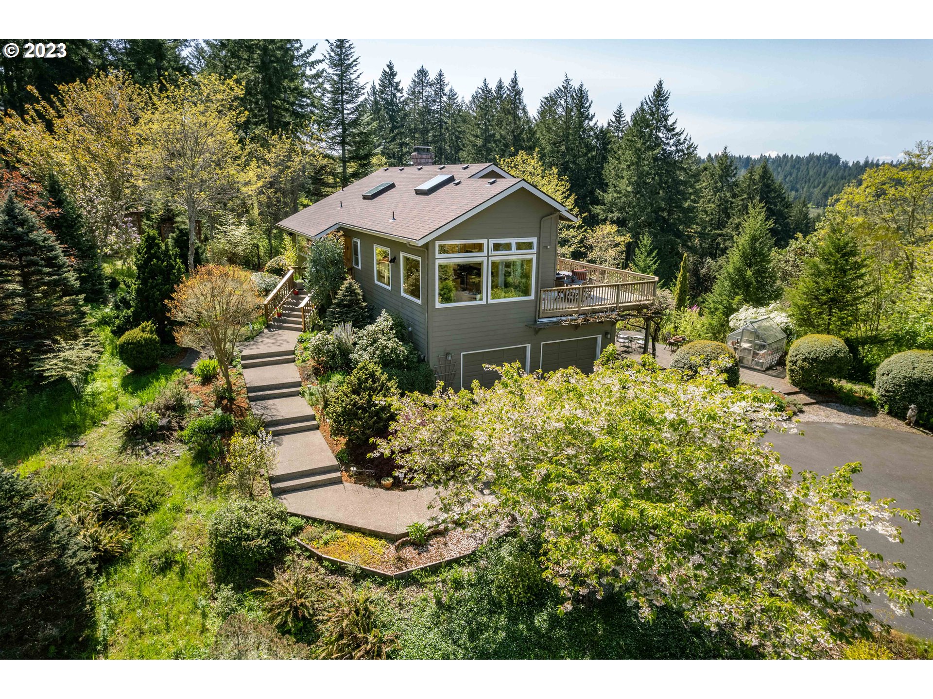 Northwest contemporary home with amazing views of Spencer Butte, the Coast Range Mtns & Fernridge Lake. Clerestory windows, skylights, vaulted ceilings, hardwood floors, living rm w/wood-burning fireplace & gas starter, spacious kitchen w/granite counters, island, gas cooking, & eating area, dining room w/French door to deck, office, master suite w/walk-in closet, shower, soaking tub & dual sink cabinet. The finished daylight basement has utility room, 2-guest bedrooms (Note: one guest bedroom does not meet code for egress but can be remedied), family room w/access to patio for entertaining, & garage entry. Home is plumbed for bi-vac, surround sound and has generator. Gated entry, deer fenced garden area w/raised garden beds, peach, apple & pear trees, circular driveway. 4J schools.  Low county taxes.