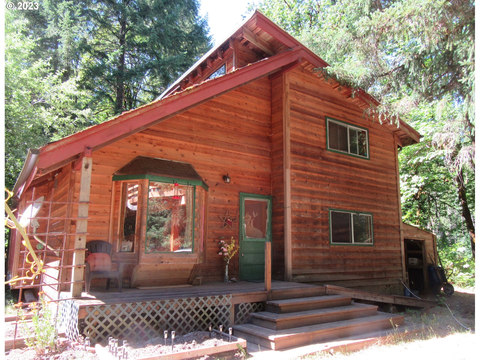 What a wonderful place! This very private retreat was designed to take advantage of the beautiful natural setting. If you are looking for a quiet home with over an acre of land, surrounded by trees and wildlife, with no close neighbors, be sure to check this one out. This is not a "drive by." The home cannot be seen from the road and there is a locked gate. Shown by Appointment Only. Call your realtor today!