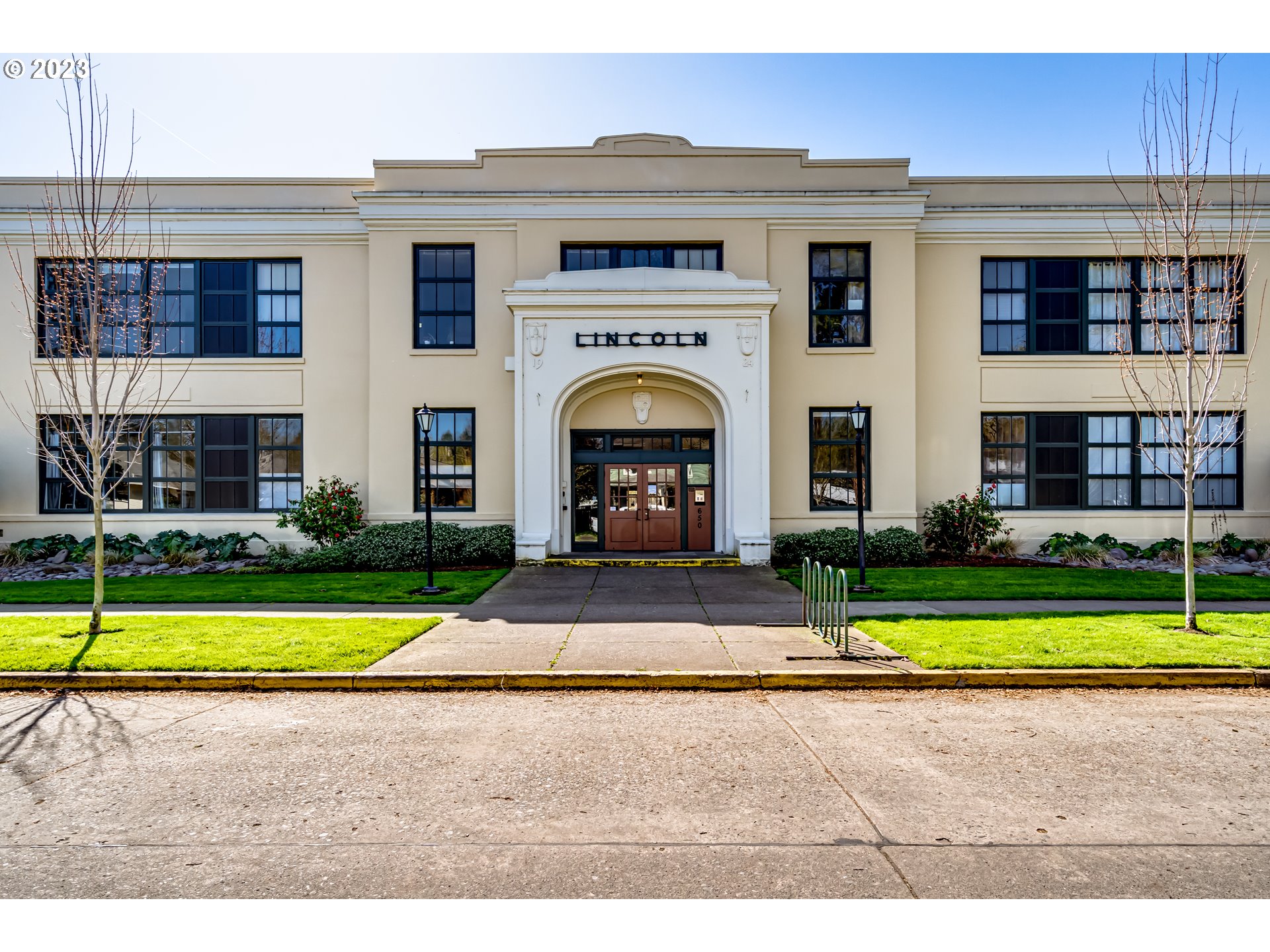 Historic charm and architectural heritage define this 1924 converted school to modern condo lofts that seamlessly blend the charm of the past with the conveniences of contemporary living. Situated in a prime downtown location, this unique living space offers a rare combination of history, style, and accessibility. Features include 12 ft ceilings, skylight, fir and travertine floors, granite and stainless in the open kitchen with balcony overlooking lovely atrium. Many units have added creative variations of lofts/sleeping platforms that work well with tall ceilings. Complimentary, shared laundry rooms, secure bike barn and beautifully maintained grounds as well as deeded parking space and rare storage unit included. Condos are located adjacent to a neighborhood park, making this a truly special place to call home.