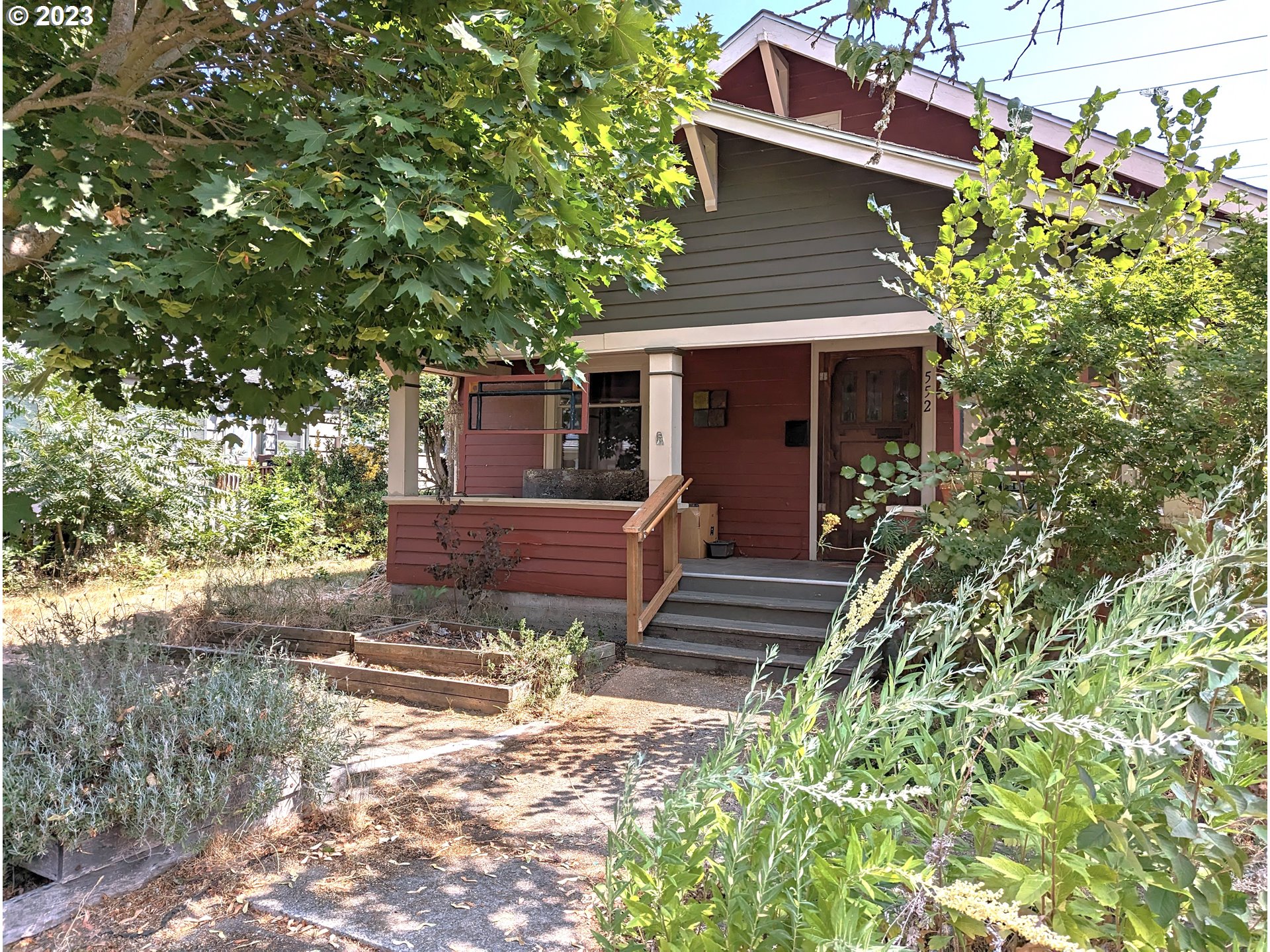 Charming 1920 Craftsman with covered front porch. Solid wood floors run throughout home. Rare Tulikivi wood burning stove in the living room! This is a Finnish soapstone masonry heater that also has a bake oven and radiates heat slowly through the house on cold days. Tile in kitchen and bath, granite counters and soapstone HEATED flooring in the bathroom. Kitchen has restored Craftsman cabinets and SS appliances. Old Craftsman front door welcomes you with handmade stained glass inserts. Off St parking and permit for additional driveway off Statesman.  1996 installed: gas furnace, AC, and electrical throughout. 2005 main drain line, water heater, and most of the plumbing replaced. Add. 800 sf of attic for storage or convert to 3rd bedroom. 2020 new roof. Large backyard fenced with a big storage building that backs up to 17th St.