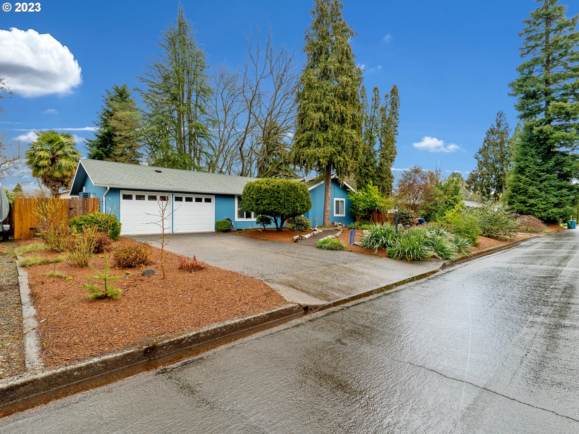 Welcome to 2639 Donegal Street, a charming ranch in the established Santa Clara neighborhood. This 3-bedroom 2-bathroom home is loaded with quality updates and is perfectly situated within the north end of town, close to stores, schools, and the Eugene airport. It is located within the 4J school district. As you step inside, you will be greeted by an open living/dining room with a large west-facing windows and a custom A/V wall with an attractive electric fireplace. There are three bedrooms and a bath off the hallway, and the main bedroom has its own en-suite bathroom. Fresh paint draws the eye throughout. Newer Mitsubishi ductless heating and cooling and a Rheem hybrid water heater, combined with stainless kitchen appliances and high-efficiency washer and dryer will allow you to fully enjoy the house. The two-car garage has new insulated doors and has been converted to extra living space but can be easily used for vehicles if you wish. Outside, you will find newer exterior paint, fencing, a contemporary cedar patio structure, and a big back yard with mature landscaping. This peaceful retreat has raised beds with culinary herbs, wildflowers, and a fire pit that allow you to enjoy beautiful summer nights. The front yard is very low-maintenance and drought-resistant with some nice fruit trees. Low county taxes and great neighbors make this an unbeatable place to live.