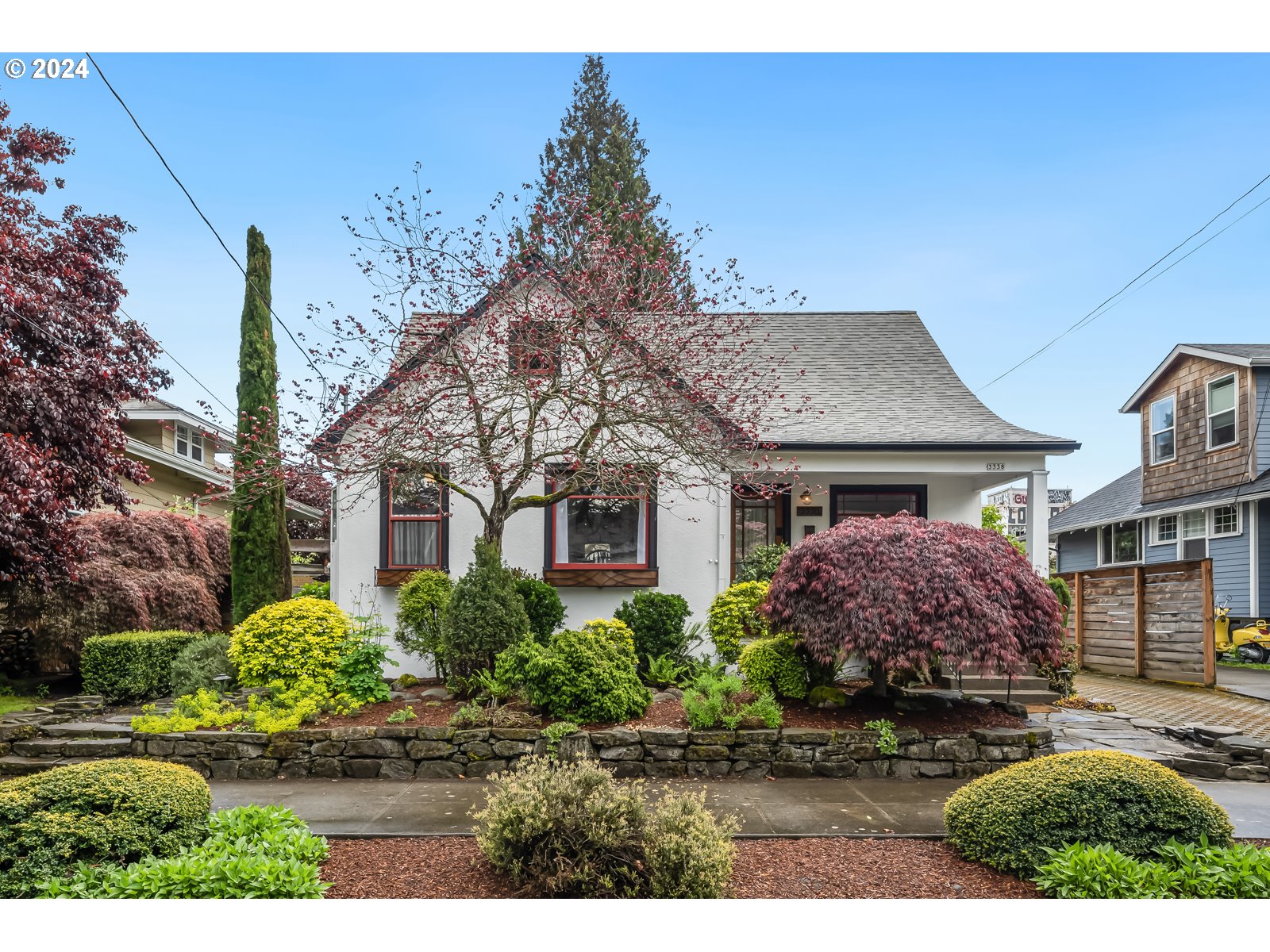 Discover the allure of this beautifully remodeled Grant Park bungalow, just moments away from Beverly Cleary K-8 School and U.S. Grant High School. Located within a short stroll of New Seasons Market, Fred Meyer, CVS, and an array of charming local shops and eateries, convenience is at your doorstep. Step inside this vintage 1929 residence to find original hardwood floors and timeless built-ins seamlessly blending with updated kitchen and baths. Downstairs, a fully finished basement apartment awaits, complete with its own laundry facilities, offering versatility as a separate living space or a part of the main home. Freshly painted exterior (2024), along with A/C and an energy-efficient hybrid electric water heater, ensure modern comfort. This property boasts a perfect fusion of vintage charm and contemporary efficiency, situated in the desirable NE Portland area. Enjoy the proximity to parks, as well as easy access to freeways and public transit. Don't miss out on this one-of-a-kind opportunity. Schedule your viewing today! [Home Energy Score = 4. HES Report at https://rpt.greenbuildingregistry.com/hes/OR10195136]