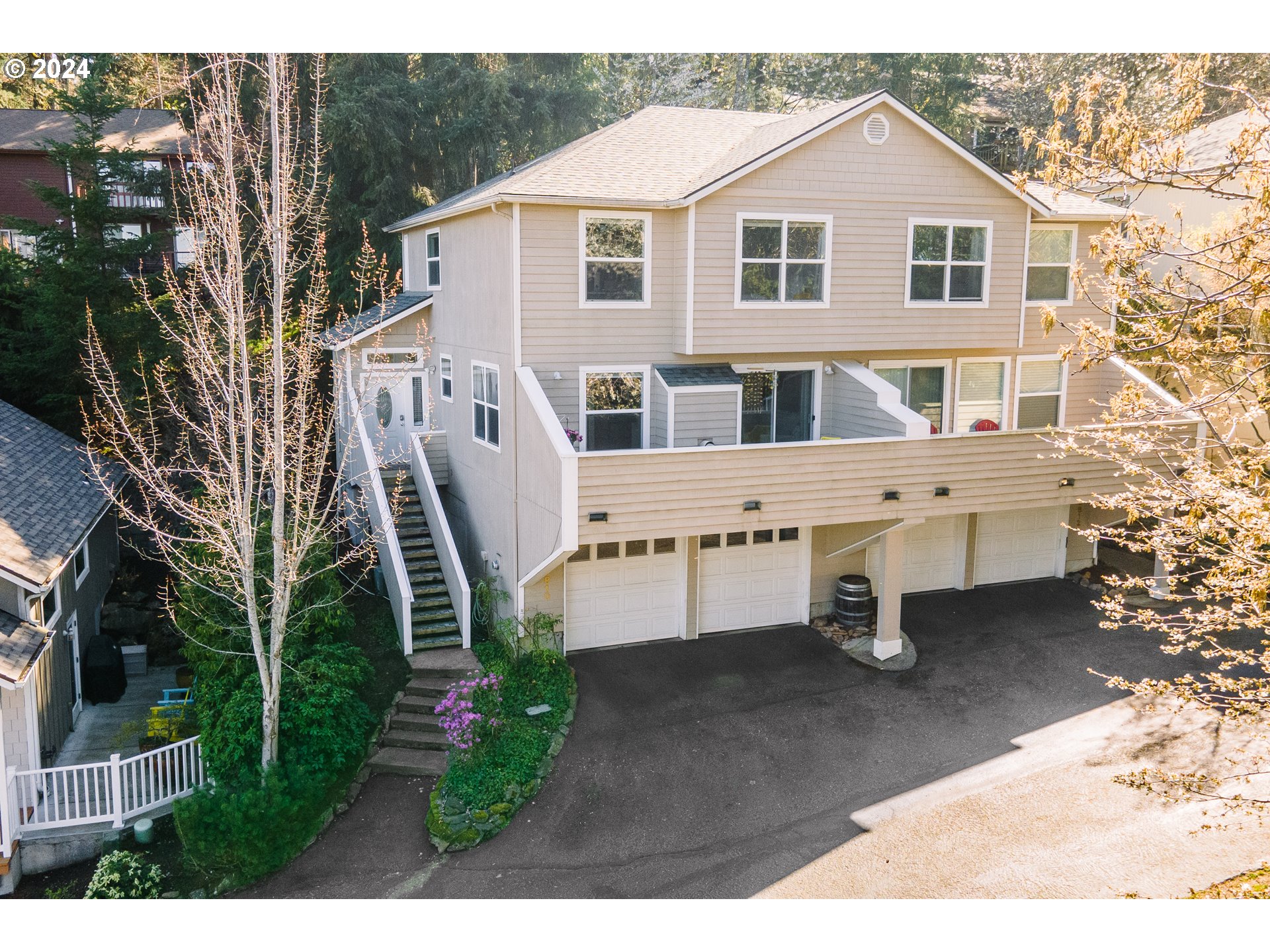 Truly immaculate and exquisite townhome style condo with incredible views from practically every window available today!  So clean it feels brand-new.  Nice floorpan suitable for a variety of lifestyles, including entertaining as well as mindful restoration or even working from home.  Both bedrooms with two full baths upstairs overlook the valley, as well as a vaulted primary suite with a walk-in shower.  All brand new stainless steel appliances (including new washer & dryer) with granite countertops make cooking a delight.  Two attached outdoor spaces -- a private balcony with beautiful views as well as a separate and peaceful back deck space.  Quiet and charming neighborhood with accessibility to trails right outside your front door.  Attached large two-car garage makes parking and storage easy and convenient.  Low maintenance unit with HOA responsible for exterior work -- including a new roof in 2021 and exterior painting in 2024.  No HOA special assessments planned.  BOM at no fault of seller.