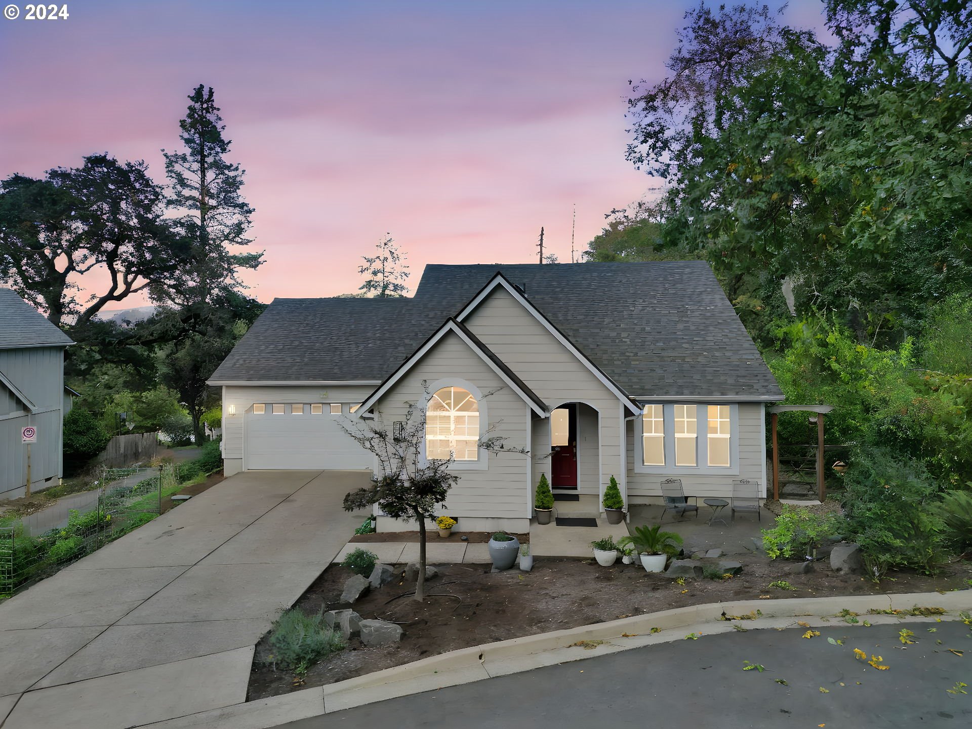 Escape to your own peaceful retreat in this delightful 3-bedroom, 2-bath Charmer located in a tranquil sought after Eugene neighborhood. Surrounded by nature, every room offers serene views, and with no thru traffic, peace and quiet is your daily reality. This home’s open floor plan makes the most of its 1,601 sqft of living space, featuring vaulted ceilings, arched doorways, and wide plank white hickory floors.The kitchen boasts plenty of cabinetry and generous counter space along sleek stainless steel appliances. Unwind in the spacious backyard with stunning Coburg Hills views. Step outside for easy access to Wayne Morse Ranch and its walking trails, dog park, and wildlife, making this home ideal for nature lovers.With a new roof, new exterior paint, and recently updated HVAC and water heater, this home offers worry-free living with modern comforts. Just minutes from shops, amenities and more, this home balances serenity with convenience.Don’t miss out on your chance to call this charming retreat home!