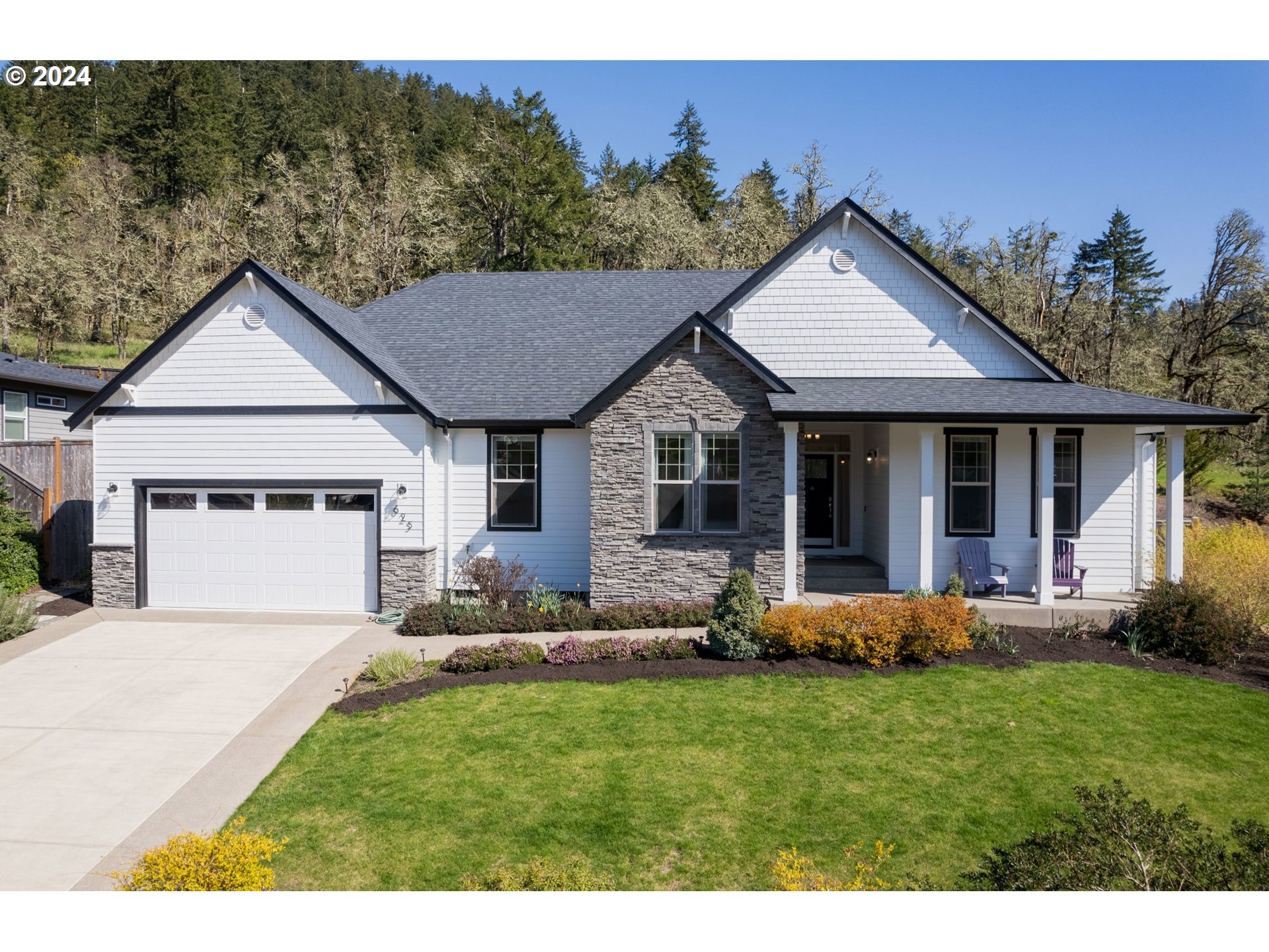 Here's the home you've been waiting for! Welcome to this bright & airy, immaculately maintained, 1-level Bruce Wiechert retreat in beautiful Mountaingate! This move-in ready, tastefully updated property features high ceilings, fresh paint inside and out, new light fixtures and hardware, and a perfect mix of wood floors and brand new carpet. Enjoy open concept living in your spacious great room w/ gas fireplace that leads to a huge dining area and a perfectly appointed kitchen. Stainless appliances, quartz counters, soft-close drawers, pantry and large island make for a wonderful gathering place that is perfect for entertaining. Unwind in the generously-sized owner's ensuite featuring free-standing soaking tub, dual vanity, tiled shower and walk-in closet. Step thru the French doors to the covered back patio where you can relax w/ friends and family, watch nature unfold, dig in the garden and delight in all the beautiful trees, shrubs and flowers. You'll love the serenity of the private, fenced backyard and the expansive valley views from the front porch and yard, both of which have fully customized landscaping and drip irrigation. There is plenty of parking in the driveway and in the oversized, finished 3-car tandem garage with 704 sf. Make this dream home your reality...call your agent today!