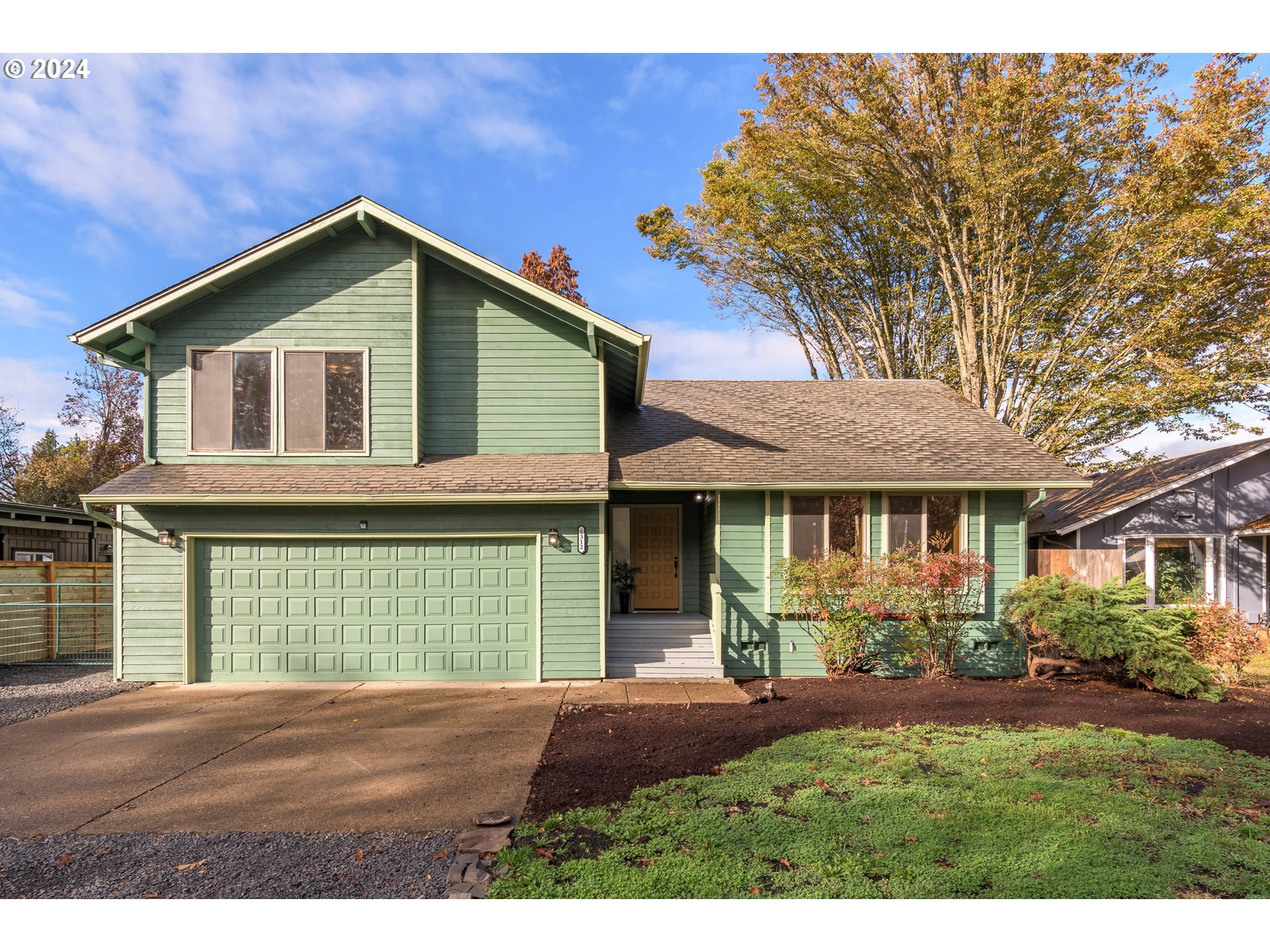 Cal Young area two-story ranch style home awaits its new owners!  The home features an inviting light-filled living room; an open dining area with French doors to the deck; a spacious kitchen with newly painted cabinetry, granite counters, stainless steel DW & range, eating bar, & desk; the cozy family room has LVP flooring & a slider to the patio for backyard entertaining; laundry room and half bath located off the family room; the 3 bedrooms and two full baths are on the second level with the large primary bedroom offering a walk-in closet,  single sink vanity and shower.  The large .14 acre lot with a fully fenced backyard is ready for someone to create their outdoor paradise and offers RV/boat parking.
