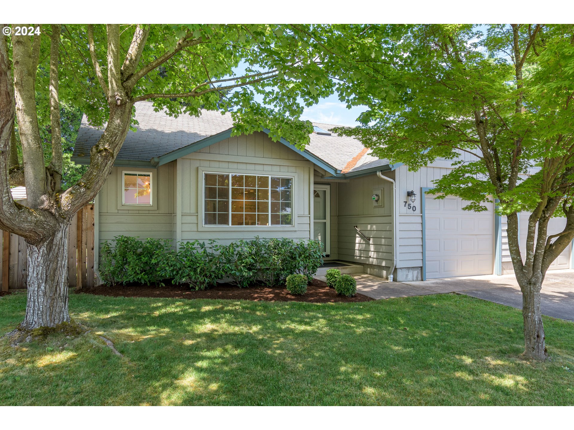 Wow...check out this nicely updated tandem home with almost 1400 sf, 3 bedrooms, 2 full bathrooms, vaulted ceilings & attached garage for only $350k! Recent updates include newer interior paint; kitchen remodel w/ freshly painted cabs, fun tile backsplash, granite slab counters and newer appliances (including fridge); new ductless HVAC system with 2 heads for efficient heating & cooling; updated bathrooms w/ new toilets; luxury vinyl tile floors in kitchen & baths, LVP floors in primary ensuite, new light fixtures w/ Phillips hue light bulbs, RGB customizable lighting, remote dimmers and programmable motion sensors throughout; Simplisafe security system w/ 2 key pads; new thermostats; tv wiring in the wall; and a BRAND NEW ROOF BEFORE CLOSING. Other features include laminate flooring in great room, walk-in closet and attached bath in primary, skylight in kitchen, indoor laundry w/ newer washer/dryer, vinyl windows w/ roller shades & plantation shutters, fully fenced & easy maintenance yard w/ underground sprinklers & retractable awning, 2 nice big shade trees in front and a sweet little private neighborhood w/ landscaped common areas.