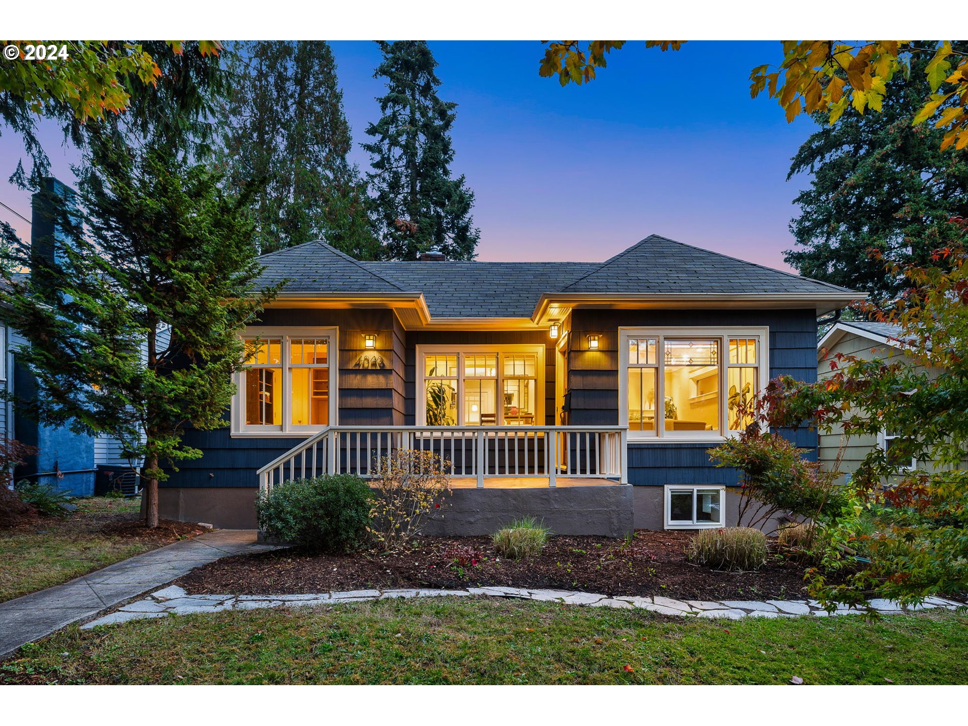 This updated craftsman is perched high above on a quiet, tree-lined street in the coveted Sabin neighborhood, one of Portland's most sought-after neighborhoods. The 2,055 square foot floor plan includes three bedrooms on the same level, two bathrooms, and a flex area downstairs that could be utilized as a family room, guest space, or office. Ideal for entertaining, the living room opens up to the dining room, which effortlessly flows to the kitchen and features a gas range, subway tile backsplash, and granite countertops. Flawlessly combining classic period charm with the modern updates needed for today's living, you'll love the preservation of stained glass windows and original built-ins. Thoughtful renovations made during the seller's tenure include finishing the basement, adding a full bathroom, adding built-ins, and updating the main bathroom. Relax in the large, fenced-in backyard with mature privacy landscaping perfect for hosting gatherings. Appreciate easy pedestrian access to Whole Foods, Irving Park, Sabin Park, Alberta restaurants, and Fremont restaurants. Do not miss your chance to own this architecturally compelling home in the heart of Sabin! [Home Energy Score = 6. HES Report at https://rpt.greenbuildingregistry.com/hes/OR10233980]