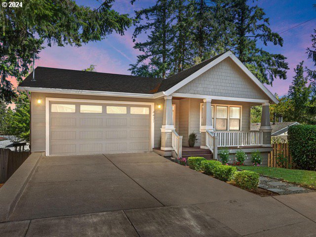 West Portland Oasis. Step into your dream home from the expansive covered porch and be wowed by soaring ceilings and a bright office/bedroom just off the entrance. The spacious gourmet kitchen is perfect for hosting, featuring top-notch appliances, endless cabinets & counters, and a vast island bar. The open dining/living area showcases a beautiful gas fireplace and a giant slider leading to a balcony, ready for your gas BBQ and outdoor entertaining. The main level’s spa-like primary suite is a dream, with stunning walk-in shower, ensuite bathroom, handy laundry, and a custom closet. From your private retreat, enjoy sunset views on the lazy balcony. The lower level features vast 10 ft ceilings and a bonus/family & media room with access to the private, fenced backyard full of potential. Live large with two more bedrooms, a big full bath, second laundry room, oversized 2-car garage and tons of storage. Extras like the climbing wall, 2-inch wood blinds, custom stone shower floor and hot tub are just icing on the cake. Located in popular West Portland Park, one of our city’s most serene and laid-back neighborhoods, you’ll be surrounded by nearly 20 forested acres, yet just minutes to downtown Portland, and popular Multnomah Village & Lake Oswego. Enjoy nearby restaurants, shopping, specialty stores & more, where you’ll have the perks of city living with a small town vibe. Close proximity to I-5, OHSU, PCC Sylvania, & Lewis & Clark College. Built by a top Northwest builder, this home is ready for its next lucky owner!