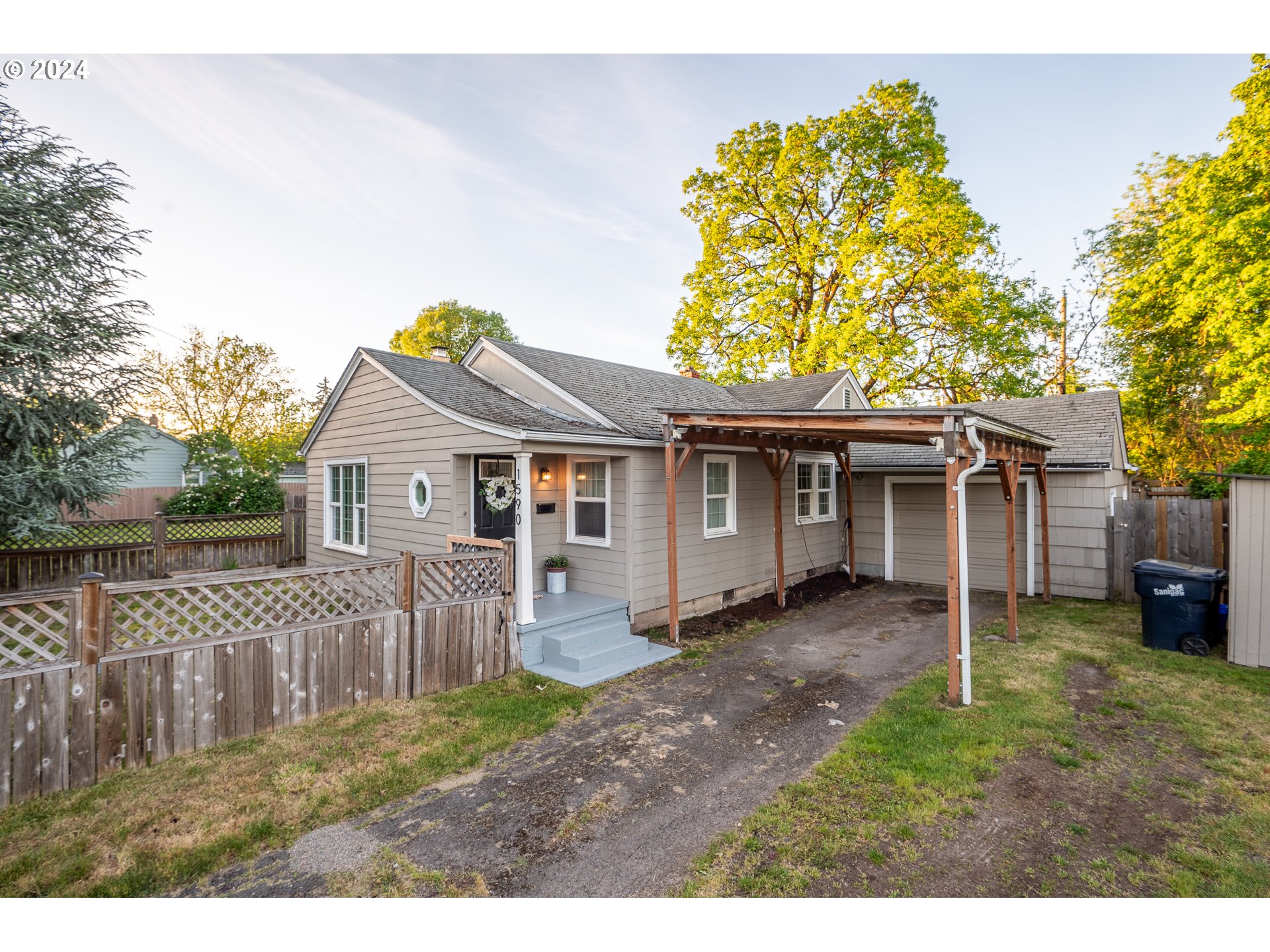 New price on this wonderful 1940s home brimming with character! This 2 bedroom home has had many updates including a fully remodeled kitchen, new flooring, new water heater and more. Ask your Realtor for a full list. All of the updates tastefully compliment the unique Eugene charm of this home. Other wonderful features include stainless steel appliances, gas range, a gas fireplace, indoor laundry room, a full single car garage, plenty of gardening space and more! The location is incredibly convenient - less than a mile to I-105, close to groceries, parks, restaurants and the Whiteaker district.
