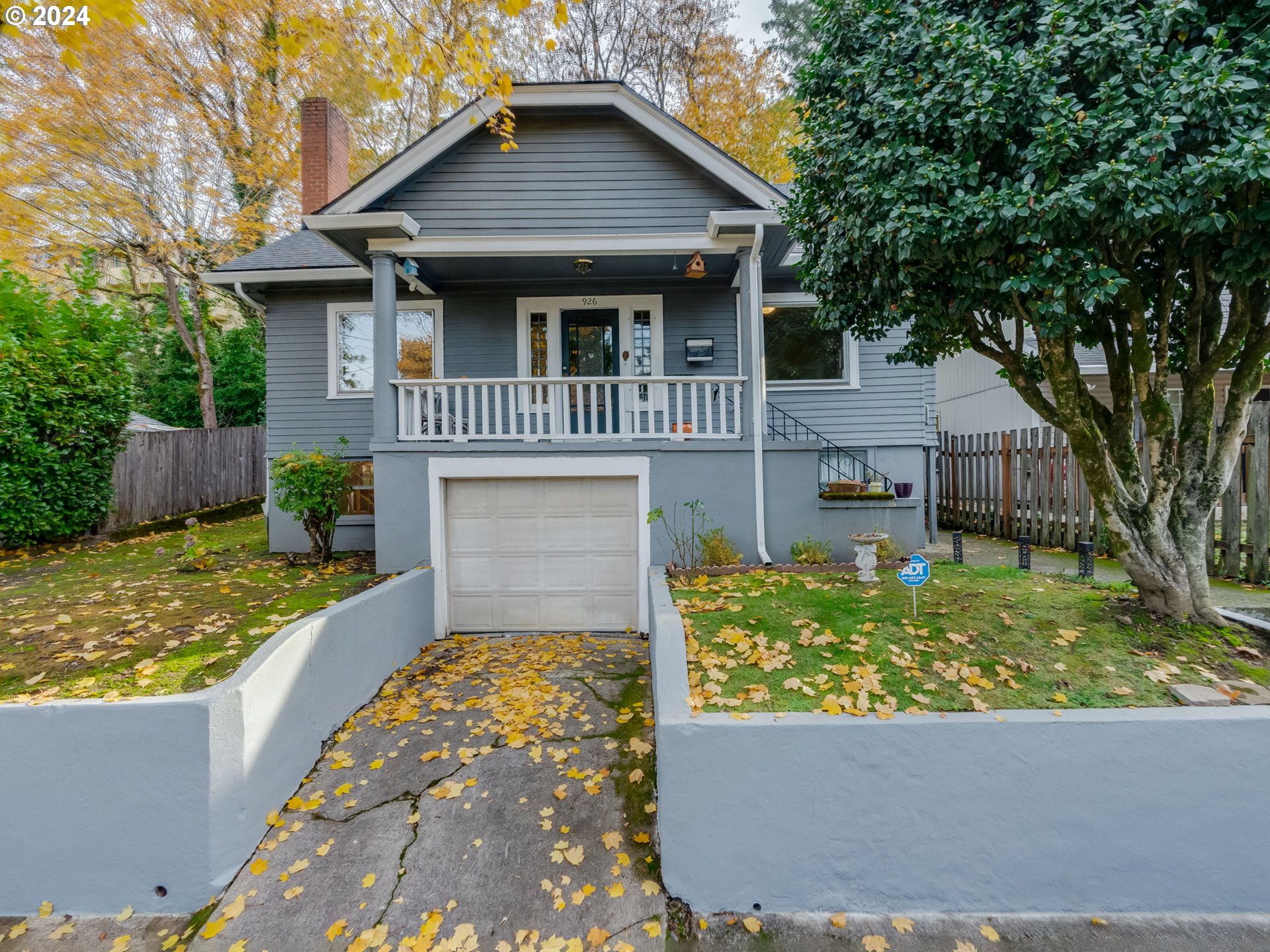 Charming Old Portland bungalow nestled in the desirable North Tabor neighborhood, featuring a welcoming covered front porch! This 4-bedroom, 1.1-bathroom home boasts a cozy living room complete with a wood-burning fireplace, perfect for relaxing evenings, while a formal dining room with original built-ins adds a touch of timeless elegance to the space.The updated kitchen is both functional and stylish, offering solid surface quartz countertops, stainless steel appliances, and a delightful dining nook. Each of the four bedrooms provides ample square footage and generous closet space, ensuring comfort and convenience for all.The basement presents a versatile space ideal for a workshop or additional storage, complete with an exterior entrance for easy access. This home combines classic charm with modern updates, making it a standout in the heart of North Tabor. [Home Energy Score = 1. HES Report at https://rpt.greenbuildingregistry.com/hes/OR10234124]