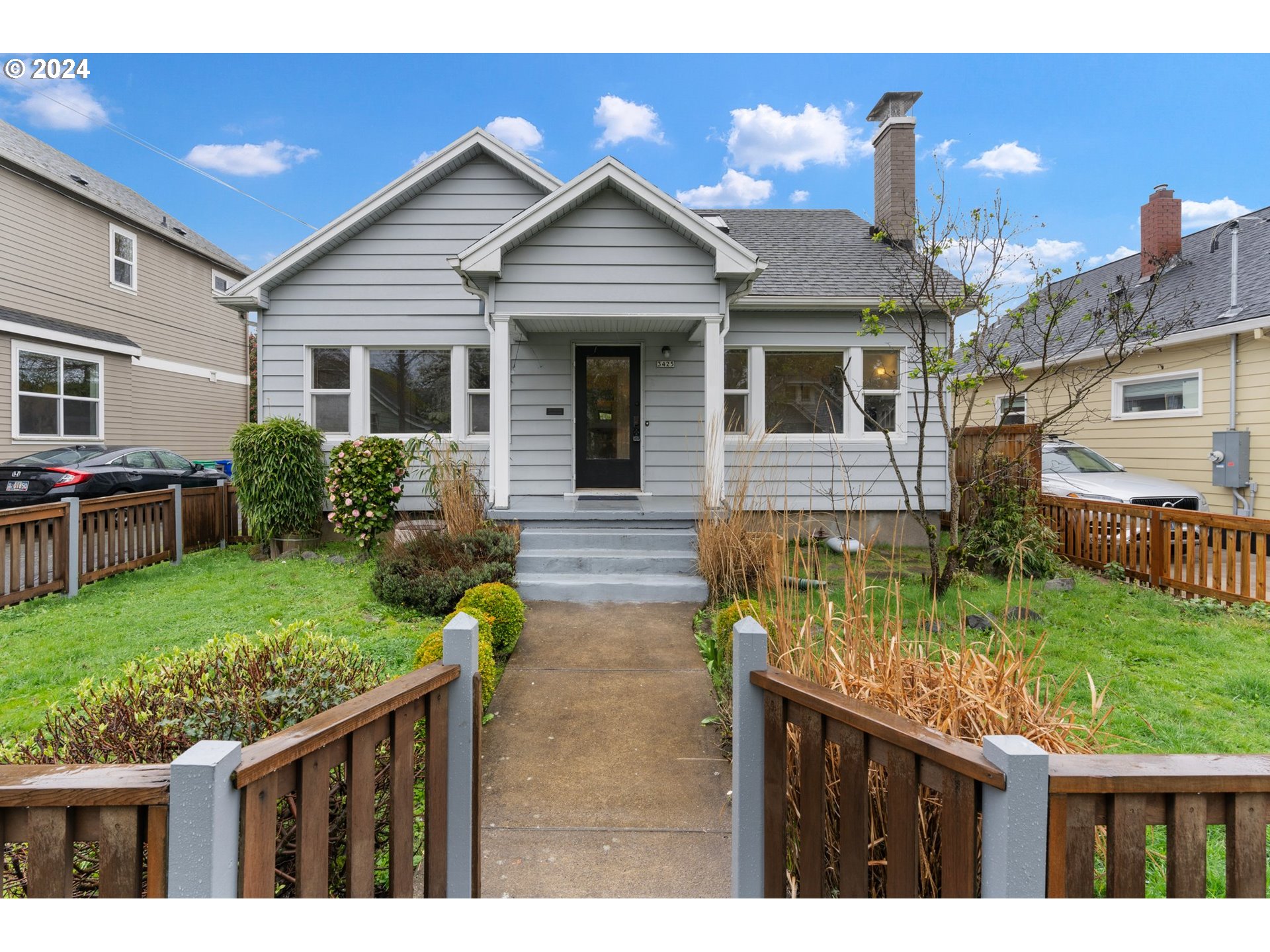 **Open Houses** Friday 3/29 4pm-6pm and Saturday 3/30 11am-1pm. Check me out! This darling bungalow has all the vintage vibe and charm you are looking for right in the heart of NE Portland. Located in the Rose City Park neighborhood, the home is just blocks to all that Beaumont Village has to offer including local shops, cafes, bars and services. Live the Portland lifestyle and sip your morning coffee on the front stoop or entertain friends on the fabulous deck in the backyard. Step back in time with these 1920s features: beautiful wood floors, sexy fireplace with built-in and original picture rail. The functional floor plan has an open living/dining room divided by a charming archway. Through the dining room is the kitchen with stainless steel appliances, breakfast nook and side door to deck, backyard and driveway. Upstairs you?ll find a large light-filled bedroom with skylights plus loft perfect for your office or hobby needs. On the main is the second bedroom with back deck access and full bath. The unfinished basement has washer/dryer, utility sink and plenty of space for storage or a workshop. Picture PNW summers on the oversized back deck and create your own private oasis in the fully fenced backyard. Need more storage? There is a detached garage at the end of the shared driveway for all your adventure gear. Stroll the sweet neighborhood streets as you mosy to local businesses like Jim + Patty?s Coffee, Fire on the Mountain for wings, Blackbird for wine and cheese or Pip?s donuts for tasty treats. [Home Energy Score = 3. HES Report at https://rpt.greenbuildingregistry.com/hes/OR10226088]