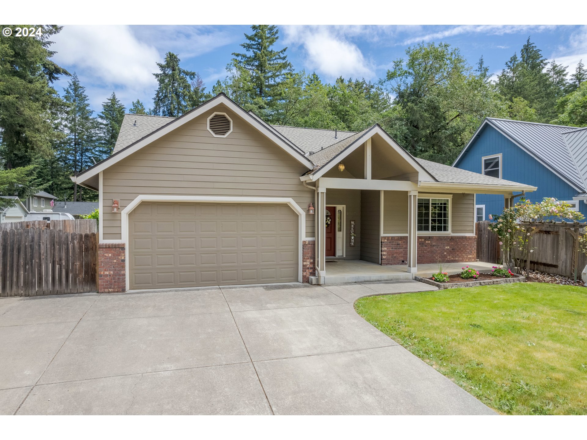 Nature abounds in this recently refreshed Veneta home on a quiet street surrounded by a private, wooded greenway area. With 4 bedrooms, 3 full bathrooms and 1926 sqft, this wonderful home features great separation of space, freshened paint, brand new carpet, 7yr old roof and heat pump, huge covered porch and patio, newly barked yard and RV Parking. You'll love the large tiled entry that leads to the main living area and spacious kitchen with stainless appliances (all included) and eating bar. The main level primary suite has a jetted tub and walk-in closet and is tucked away from the 2 other bedrooms and hall bathroom. Upstairs you'll find the 4th bedroom/office, a very nice tiled bathroom with shower and a huge bonus room with skylights. The sunny, fenced backyard with underground sprinklers, garden beds and fruit trees (cherry, apple, pear) feels very private and is perfect for entertaining, gardening and relaxing. This well-priced, move-in ready home is waiting for you!