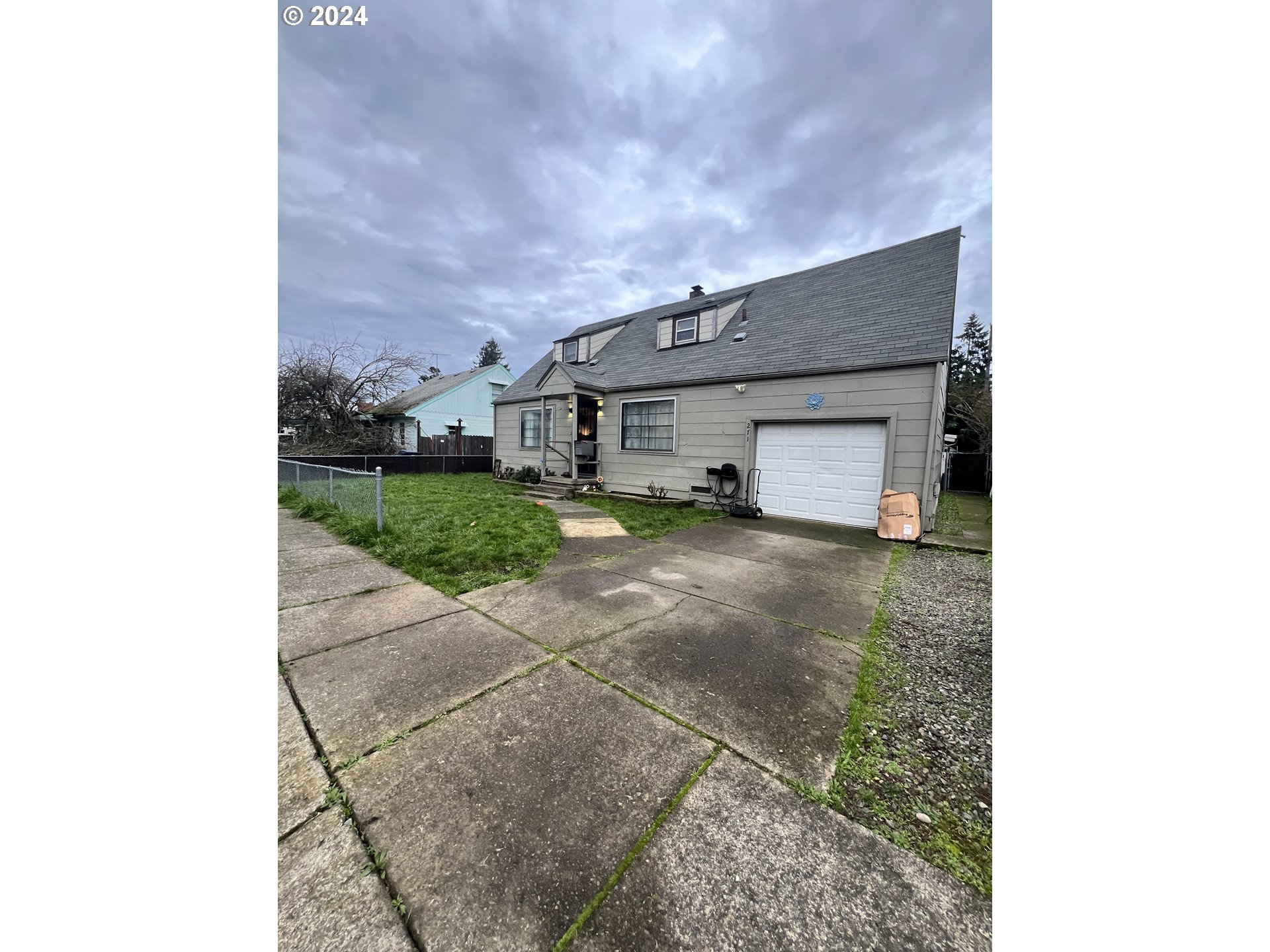 Four Bedrooms! Large lot! This home is ready for new owners! Bring your creativity and finish the home to your liking. The home also has an extra deep garage, greenhouse, storage shed and more!