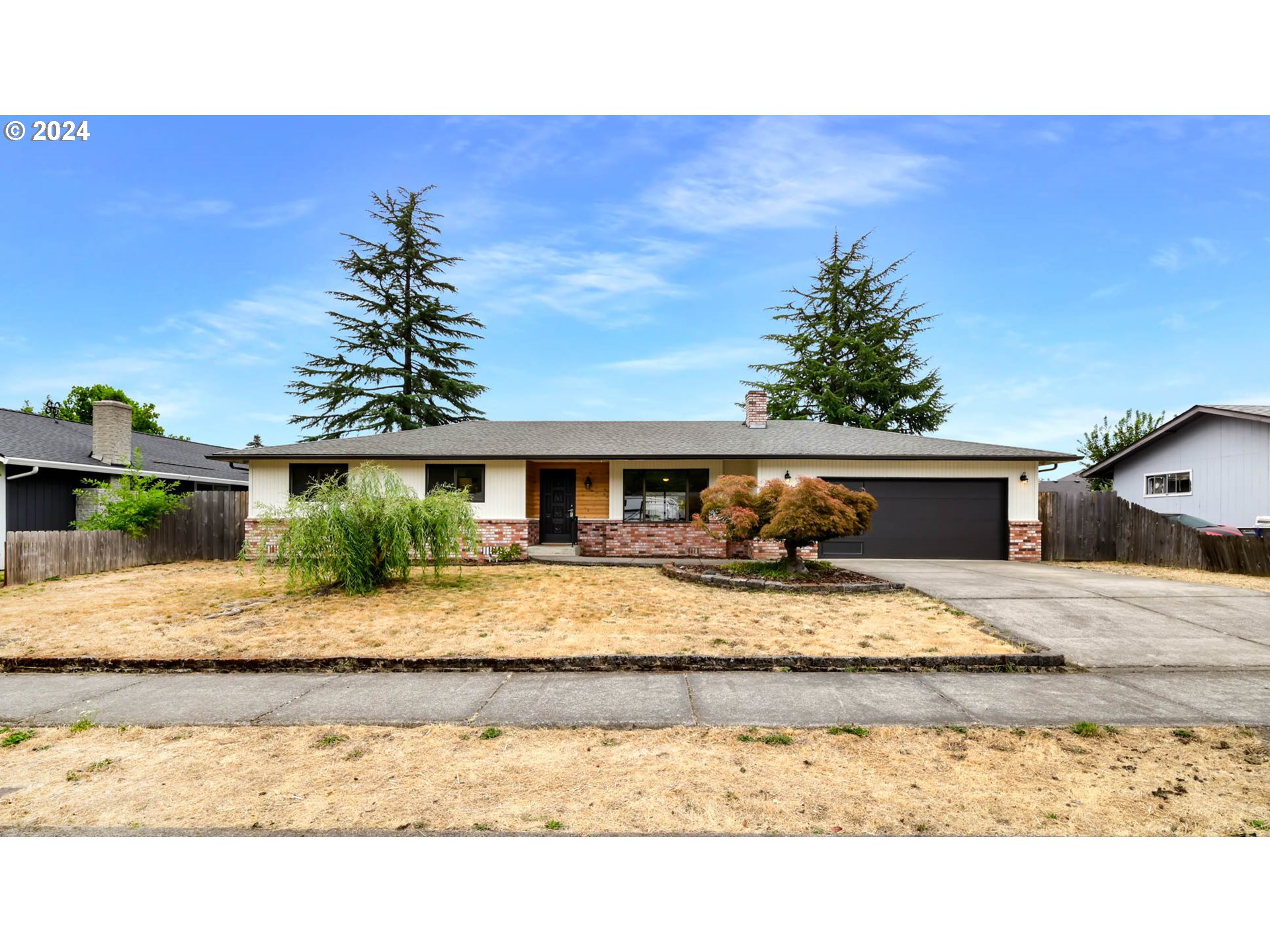 Move in Ready! This 3 bedroom 2.1 bath home located in a quiet Thurston neighborhood has brand new professionally installed LVP flooring and fresh interior paint throughout. The open floorplan offers a living room with views of the beautiful Thurston Hills, a spacious kitchen with ample cabinetry and counter space as well as an eating bar. Off the dining area is a laundry room with half bath that leads into the oversized 2 car garage with attic storage, new garage door and automatic opener and a 15x9 bonus/workshop/storage space. There is also access off the dining area to a covered patio and fully fenced back yard. The large primary bedroom suite has plenty of room for a king-size bed, walk-in closet and a full bath with newly refinished large stand-up shower.