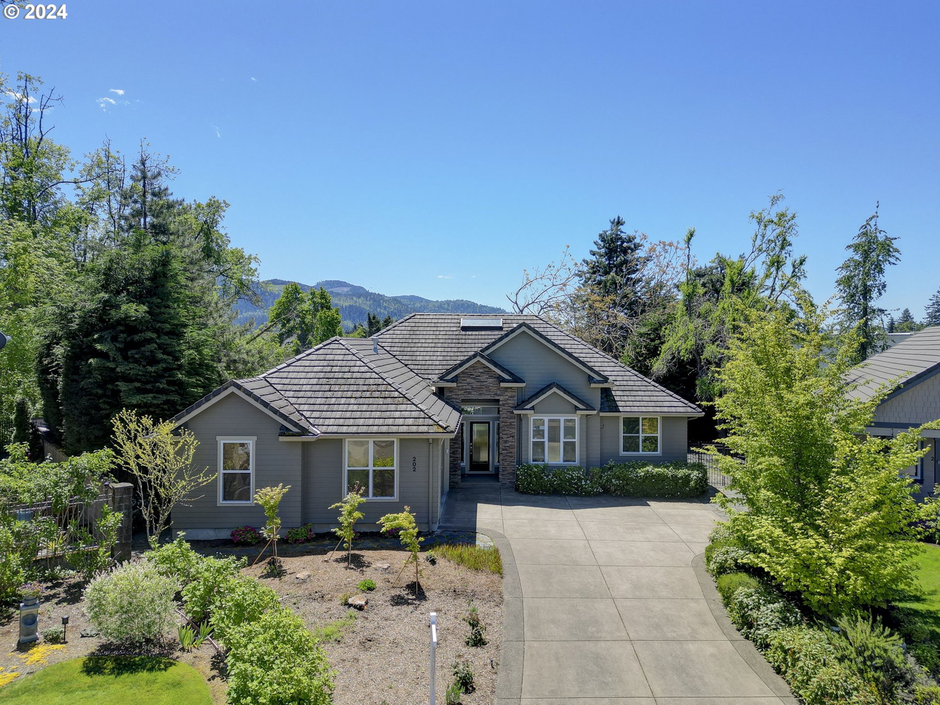 Nestled in a tranquil cul-de-sac in Emerald Valley West, this turnkey single-level home offers quality craftsmanship and thoughtful design. With real curb appeal, the tone is set for a gorgeous interior. Step inside the naturally lit great room. With vaulted ceilings, south facing windows, and skylights, a bright and airy atmosphere awaits! The open kitchen features stainless steel appliances, a gas range, granite countertops, a faucet with hands-free features, and a spacious eating bar, perfect for meal preparation and casual dining. The spacious living room has a free-standing gas stove, adding cozy ambiance to the space. In addition, there are built custom shelves surrounding the included television and surround sound system. Adjacent is a breakfast nook and a formal dining room that can easily double as an office or sitting room. The home offers excellent separation of space, with the primary suite on one side and two additional generously sized bedrooms with a full bath on the other. The primary suite has its own access to the back patio and a large bathroom with walk-in closet. Outside, the expansive and private backyard beckons with mature landscaping, a large covered patio for outdoor entertaining, multiple seating areas, raised garden beds, underground sprinklers, and a tall block fence for privacy. The 2-car garage is oversized with included cabinets and a garage fridge. Additionally, the home has cement lap siding, a concrete tile roof, vinyl windows, forced air heating, and air conditioning. Take advantage of nearby amenities such as the community sports complex with tennis/pickle ball and basketball courts, or indulge in peaceful days at the popular golf course nearby. This home offers retreat-like living with all the comforts for modern life in a coveted location. This is truly a forever home. More photos coming soon!