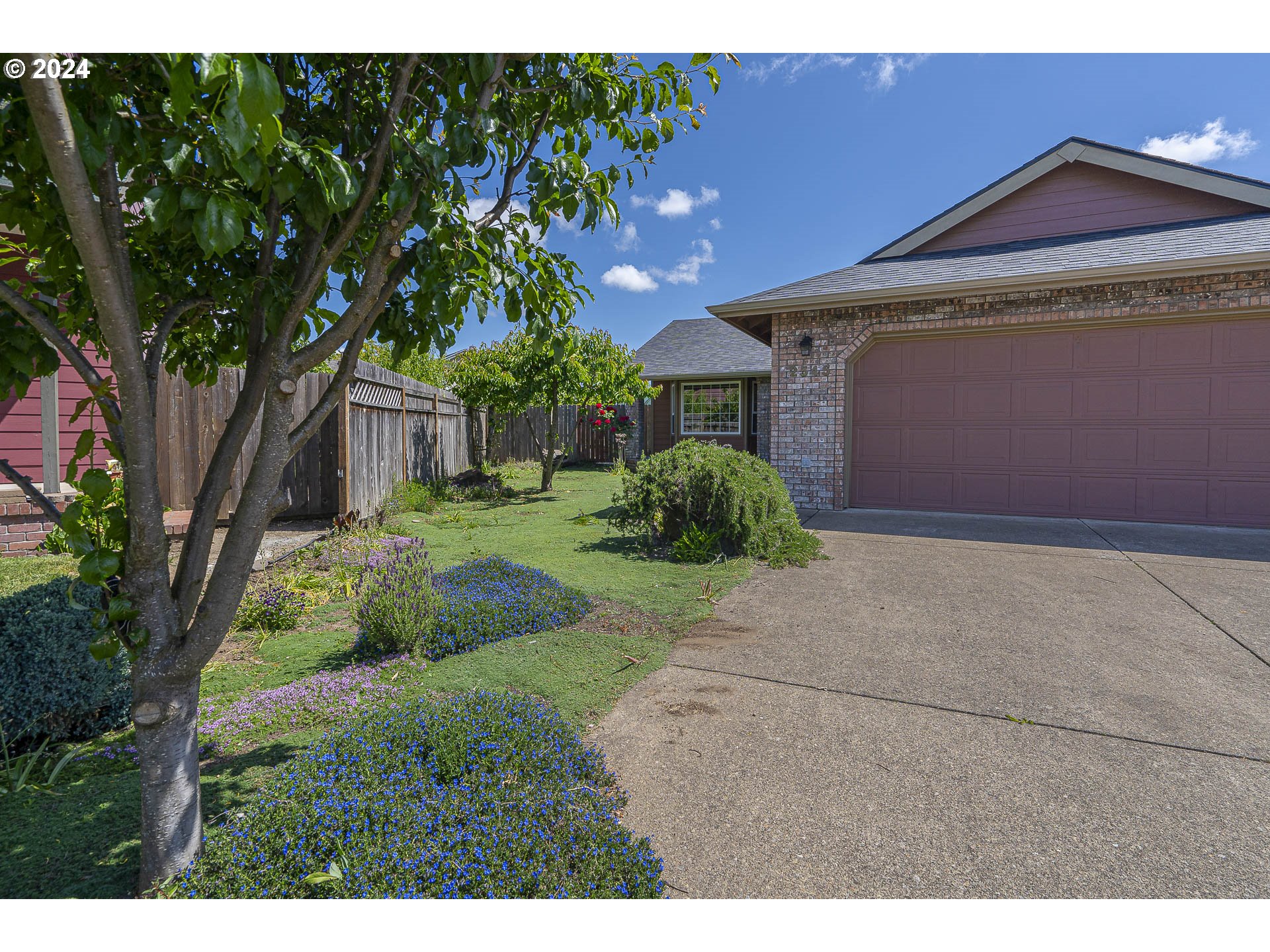 Won't last! Great contemporary 1648 sq ft home in desirable west Eugene neighborhood. This 3 bedroom 2.5 bath is tucked in quiet dead-end cul-de-sac. Home has a two car garage with bonus 12'x 48' RV parking. Private, fully-fenced yard ready for garden or open for flowers galore. Fruit trees in front and back yard. Small koi pond in backyard. Sun room or greenhouse connects with one bedroom. Well-lit formal living room features bay window with window seat and storage. Primary bedroom contains large cedar closet as well as an attached full bath. Kitchen has been updated with newer stainless steel appliances and granite counter tops. Great room boasts modern open living,                                     vaulted ceilings, skylights, gas fireplace, and sliding door access to back concrete patio. Patio has outlet wired and ready for jacuzzi or hot tub. Roof and heat pump replaced in 2017. Water heater replaced in 2021.  Open house 5/24 Fri 5:30-8:00 pm, 05/25 Sat 1:00-3:00 pm, 05/26 Sun 1:00-3:00 pm. Come see this move-in-ready-property today and pack your things for your new home tomorrow!