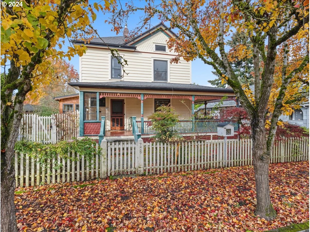 Don't miss this opportunity to own a one-of-a-kind classic PDX home! Situated on an oversized lot, the property features a patio and a charming brick courtyard, perfect for outdoor enjoyment. The large covered porch invites you into a welcoming foyer, leading to a spacious living room and formal dining room, fit for a king. The home boasts four generous bedrooms with high ceilings and newer carpet, along with updated kitchen appliances and a cozy sunroom that opens to the backyard. This unique home offers additional lot space, presenting excellent development potential. With stunning original woodwork trim in mint condition and beautifully preserved sliding French doors, this home is truly a rare find.