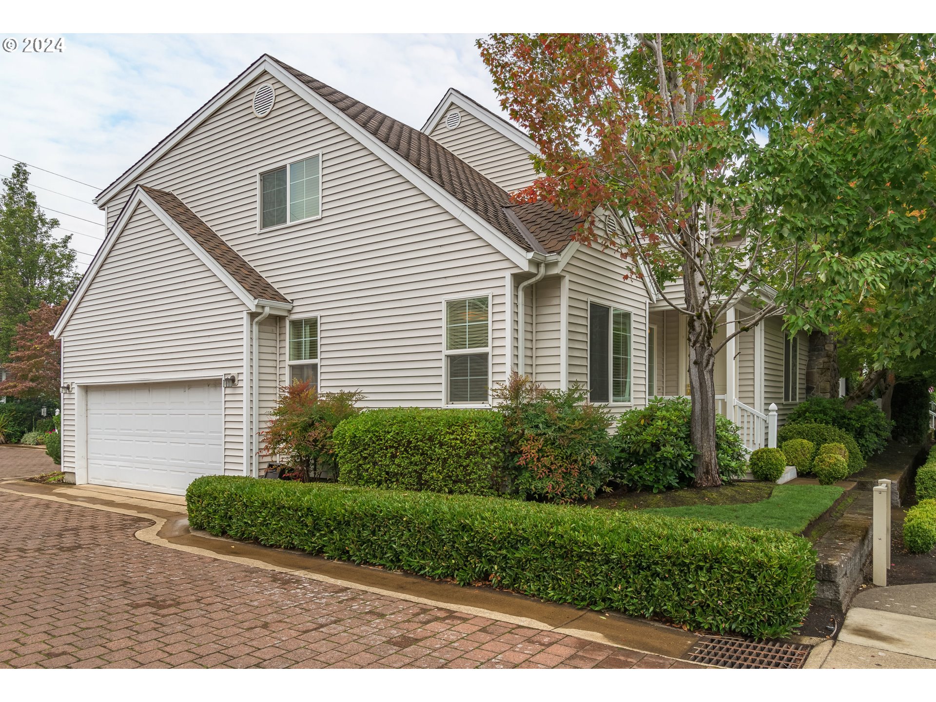 Welcome to Easy Living in Gated Quail Run Community! With 3+ bedrooms, 3 full bathrooms, almost 2800 sf and a 2-car garage, this light-filled, detached home offers high-end amenities and room for everyone inside without the hassle of extensive upkeep outside. You'll love the hickory and pecan hardwood floors and the great room that is drenched in natural light with 18 foot ceilings, transom windows and gas fireplace. The beautifully updated kitchen features quartz counters, newer stainless appliances, gas range, tile backsplash and newer sink & faucet. With 2 beautifully appointed ensuite bedrooms (1 on the main level and 1 upstairs) along with another full bed/bath on the main level and a large bonus room w/ walk-in closet upstairs, this home is perfect for aging in place, accommodating guests and/or multi-generational living. You'll also appreciate the vaulted ceilings, fresh paint, central heat & air, built-in vacuum & ample storage. The private courtyard is the perfect size for relaxing outside, grilling on the BBQ & enjoying a few flowers. If doing more gardening is your passion, you'll love working in the community garden. Speaking of community, get to know your neighbors during frequent get-togethers & events or host a party in the community club house. Other amenities included in the low dues ($170/mo) are grounds maintenance, snow removal, overflow/RV Parking and garbage service. Incredible location close to Willamette River Trail System, Alton Baker Park, Cuthbert Amphitheater, Autzen Stadium, Chase Medical Care, etc.