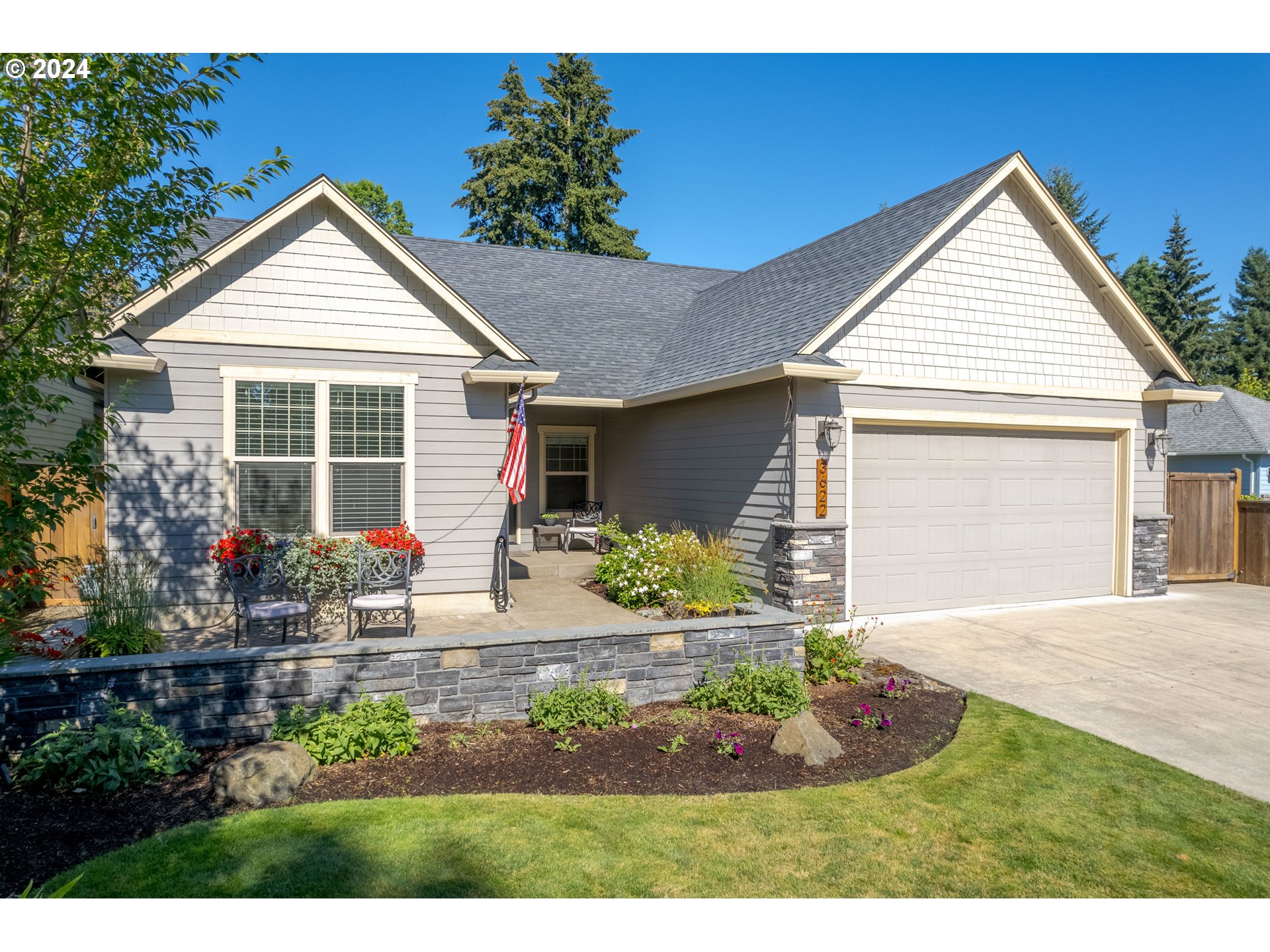 Pride of ownership on display in this lightly lived-in, 1-level,  Wiechert home on almost 1/4 acre with incredible indoor/outdoor living & upgrades galore! Offering all of quality features and finishes that this builder is known for, this special property also has a professionally designed outdoor oasis that is a true showstopper! You'll love the stone patio, seating wall and flowering shrubs & trees in the front yard but the backyard will take your breath away. With a huge covered outdoor living room, extensive hardscaping, water feature, dry creek bed, newer hot tub, mature dogwood & maple trees, raised garden beds, full irrigation system and tool shed w/ power, your living space has been expanded and you'll never want to leave home. This is a true gardeners paradise with blueberries, raspberries, asparagus, tomatoes, hops, miniature apple tree, bay leaf tree, elderberries, mint, basil, sage, thyme, hydrangea, apple blossom clematis, lilies, orchids and gardenia. Inside you'll love the vaulted ceilings, open concept layout, great room w/ gas fireplace, gourmet kitchen w/ quartz counters and stainless appliances plus excellent separation of space. With 4 bedrooms total, the primary ensuite is your own retreat with attached bathroom, walk-in closet, dual vanity, new quartz counters (in both baths) and new stain resistant carpet. Other features include solar tubes, custom blinds, fresh interior paint, upgraded light fixtures inside, outdoor lighting, hardi-plank siding, gas furnace & water heater, A/C, attic storage in the garage, plenty of parking for RV or boat and feeds to 4J Schools! Immaculately maintained by original owners and completely move-in ready!
