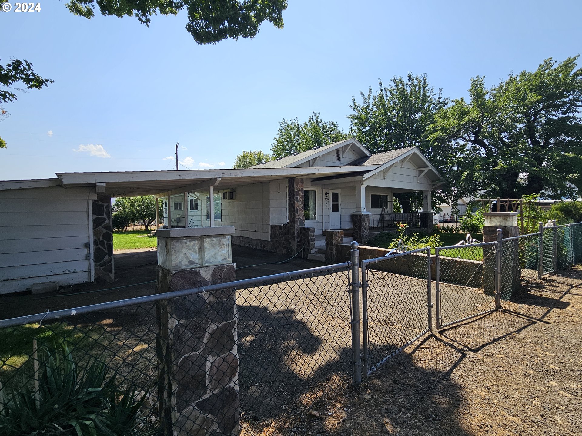 BEAUTIFUL CRAFTSMAN STYLE HOME BUILT IN 1930 IN THE HEART OF EAGLE VALLEY, THIS HOME HAS BEEN WELL TAKEN CARE OF ON A NICE CORNER OVERSIZED LOT WITH A BEAUTIFUL FENCED YARD WITH APPLE, PEACH, PEAR, PLUM AND CHERRY TREES AS WELL AS A SMALL GRAPE VINE. FINISHED BASEMENT FOR STORAGE WHICH INCLUDES A SINK AND A COUNTER FOR WASHING AND CLEANING FRUIT. PROPERTY HAS A RAINBIRD WATER SYSTEM AND 2ND ST. ACCESS THROUGH DOUBLE GATES. THIS IS A BEAUTIFUL MUST-SEE PROPERTY.