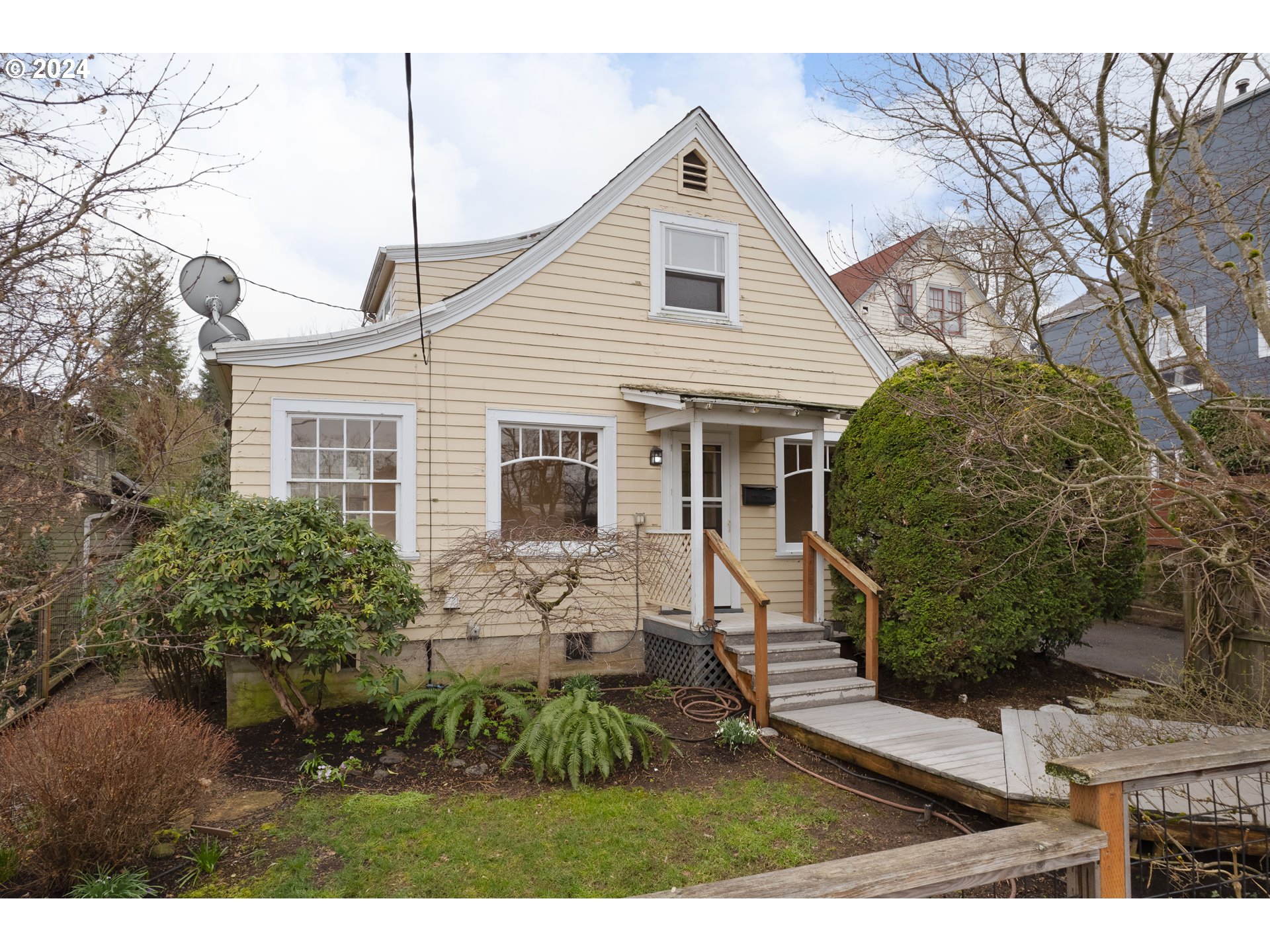 Open House Sun 2/25 from 1-3pm! Opportunity Awaits with this Fixer-Upper on College Hill! Charming, light-filled 1920's bungalow is ready to be restored to her original glory or modernized for a new generation! Features a mix of oak and fir floors, arched doorways, sunny living room, sweet dining nook, efficient kitchen, main level bed and bath plus a huge upstairs bedroom. Appears to need new roof, some foundation and retaining wall work, paint inside and out, all the cosmetics and so on but did have 200 amp electrical upgrade in 2009 and 2-head ductless HVAC system installed in 2019. Also includes 244 sqft detached garage with washer/dryer hookups and approx 200 sqft loft area. Super cute and ultra private yard with composite deck and lots of flowering shrubs. Amazing central location literally just a few blocks from downtown, parks, schools, restaurants, grocery, and more. Seller will only consider as/is, cash offers. Ask your agent to see the inspection report on file. Offers are due by 3pm on Monday 2/26 and will be responded to by 8pm on Tuesday 2/27. and for more info on the offer review timeline. Bring your design skills and your imagination to envision what a beauty she could be again!