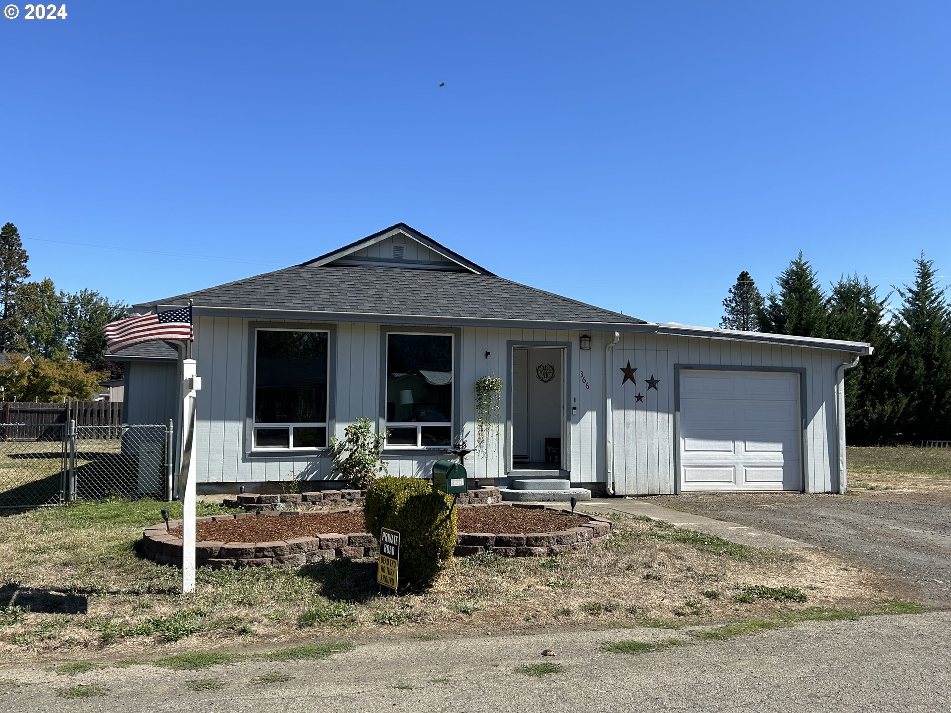 Looking for a little elbow space?  This spacious home in an established neighborhood on a dead-end street, offers plenty of room for a family to grow. An extra-large living room makes it ideal for entertaining guests or just relaxing with plenty of room to breathe! Complete with a large primary suite and additional bedrooms with bonus office (currently being used as a bedroom) and updated bathrooms are a plus! The large kitchen with gas range is a delight for the inspired chef in us all! Load the walk-in pantry with all your favorite foods or snacks! Included is a great separate mancave/workshop outback (not included in SQFT) providing endless possibilities! Located on .28 of an acre gives plenty of room to garden or for the kids and animals to play in a completely fenced yard!  This property is approx. 2 miles to interstate 5 and make easy freeway access for commuting to Roseburg or Cottage Grove. Additionally, it comes with a single car garage and plenty of parking on the side for an RV, toys or boat storage. This property is perfect to add your personal touch. Personalize this home and you’ll have quite a gem! Seller is related to Listing agent. Motivated seller!