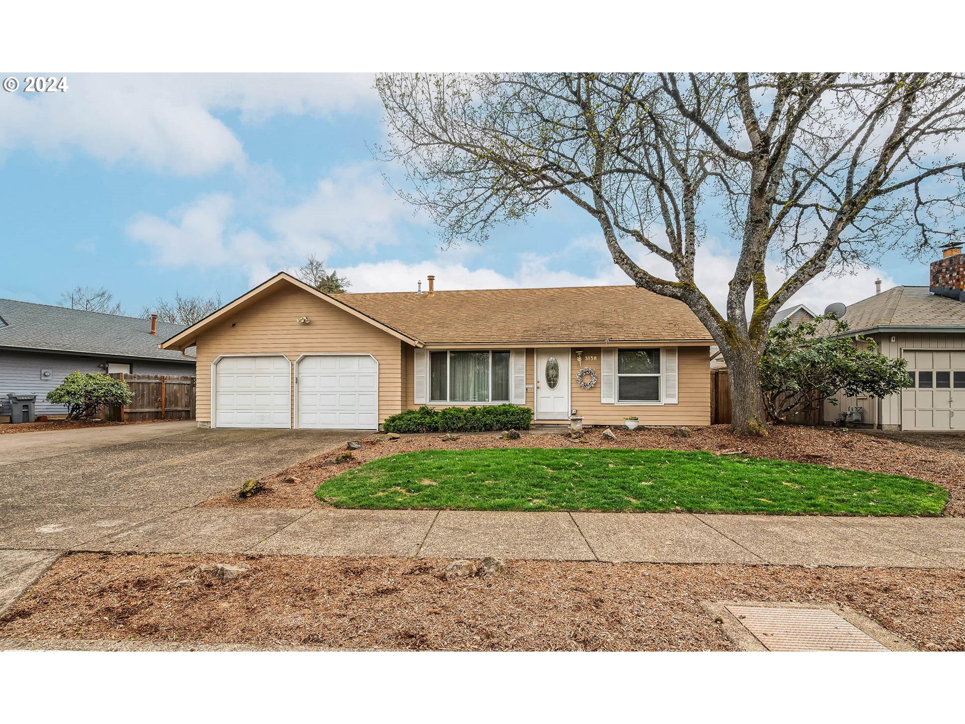 Welcome to this meticulously maintained home nestled in the desirable Ferry Street Bridge neighborhood. This one owner home shows an abundance of care and has been well maintained. Upon entering, you're greeted by a spacious living and dining area, ideal for entertaining guests or relaxing. Transition seamlessly into the kitchen featuring stainless steel appliances and family room, complete with a charming wood fireplace. From here, step outside to the fenced backyard and patio. This home features four bedrooms, including a primary suite with vaulted ceilings and sky lights. There is an ensuite bathroom with walk in shower and attached bedroom that could be an office. There is a two-car garage with attic storage and RV parking lots of storage for vehicles and toys. Don't miss out on the opportunity to make this your home, schedule a viewing today!