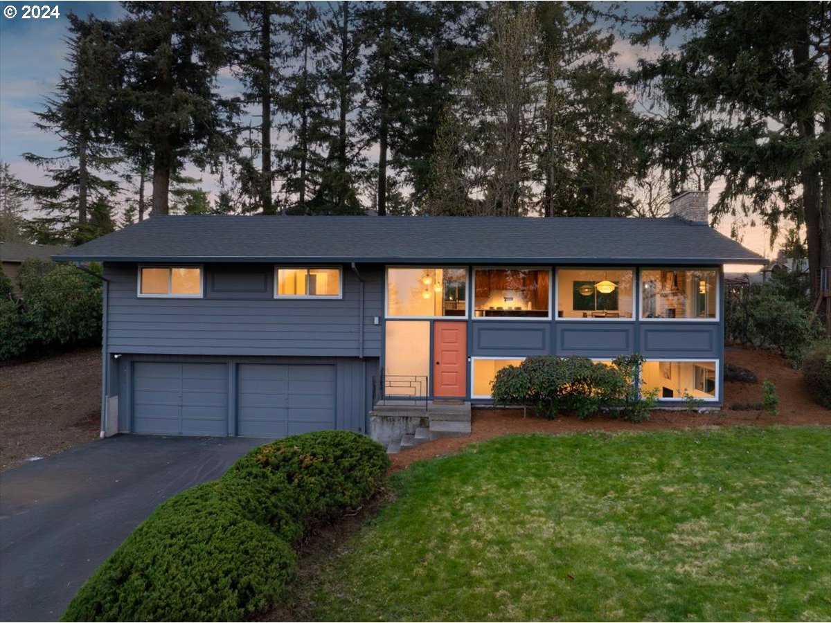 Incredible value in West Linn! The premium location, top schools, mountain views, huge lot, and modern upgrades make this home a cannot-miss opportunity. The mid-century modern design and high-end finishes create a luxurious experience throughout the home. Enjoy the best that West Linn and Lake Oswego have to offer, with quick access to Hwy 43 and some of the best restaurants in the entire metro area. Wake up every morning to gorgeous views, including two mountains. The huge yard offers a fantastic opportunity to enjoy the outdoors with plenty of space to park an RV, boat, and more. Extremely low-maintenance with a newer roof, plumbing, furnace, windows, driveway, and brand-new AC unit. The huge bonus room on the lower level is perfect for a home gym, second living room, playroom, office, or more. The brand-new kitchen offers some of the finest finishes with custom cabinetry, a pot filler, new appliances, new hardwood floors, a new sink, and a double waterfall quartz countertop. The bathroom is thoughtfully upgraded with the finest Terrazzo flooring. Take advantage of the opportunity to enjoy a luxury West Linn lifestyle at an incredible value!