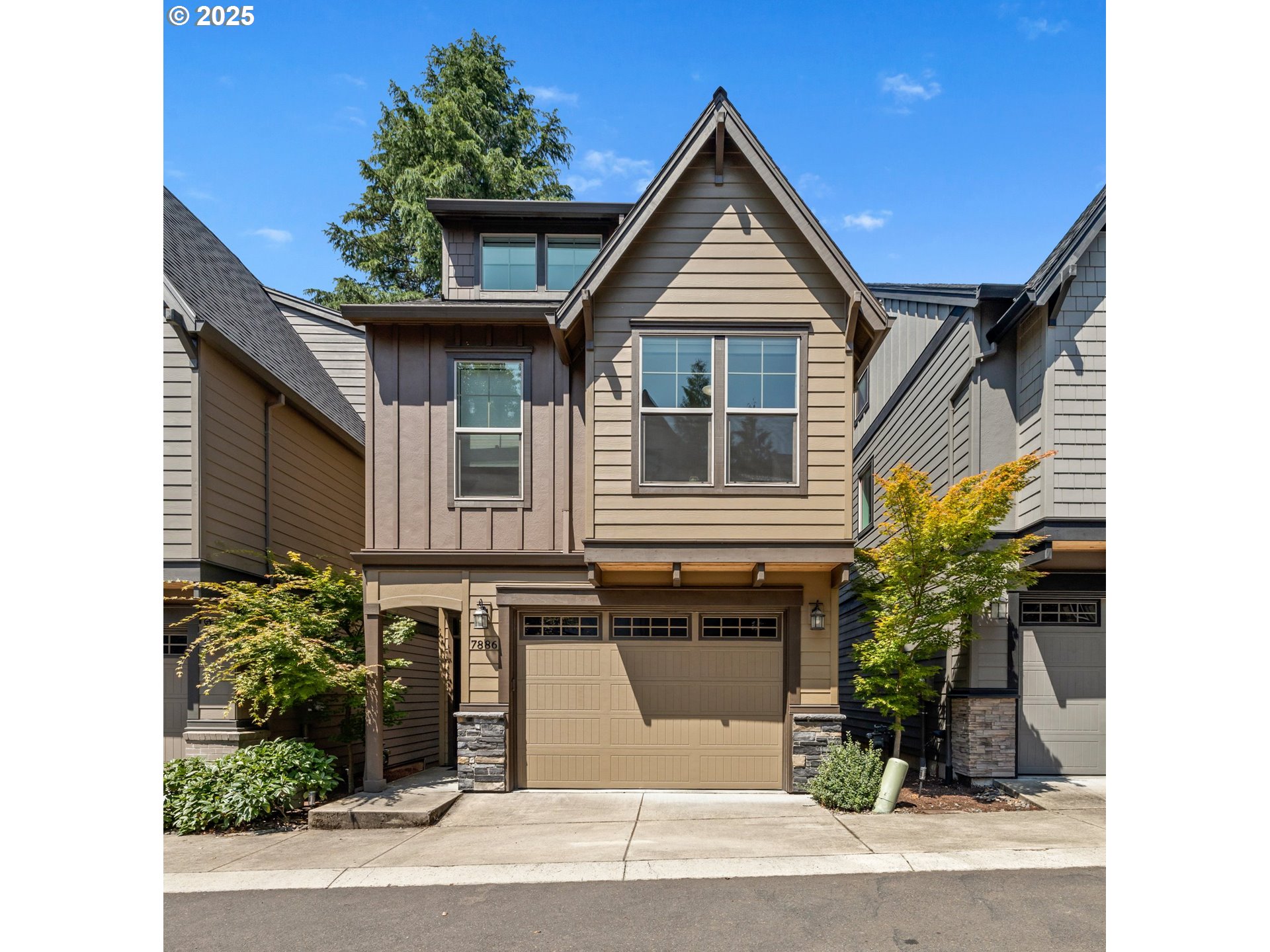 Beautiful and spacious detached condo in a prime location near Multnomah Village and Hillsdale. This home features a modern open floor plan with high ceilings, detailed millwork, custom built-ins, a cozy gas fireplace, and designer touches throughout. The kitchen is equipped with quartz countertops, a large island, stainless steel appliances, and a walk-in pantry.The generous primary suite offers west-facing views, a spa-like bathroom with a fully tiled shower, soaking tub, and walk-in closet. Upstairs includes three bedrooms plus a large bonus room—perfect for a media room, playroom, or flexible living space.Outside, enjoy a charming and private fenced deck and yard area with a gas hookup for grilling. Tucked in a quiet, desirable community with low quarterly HOA dues, this home offers both convenience and tranquility.