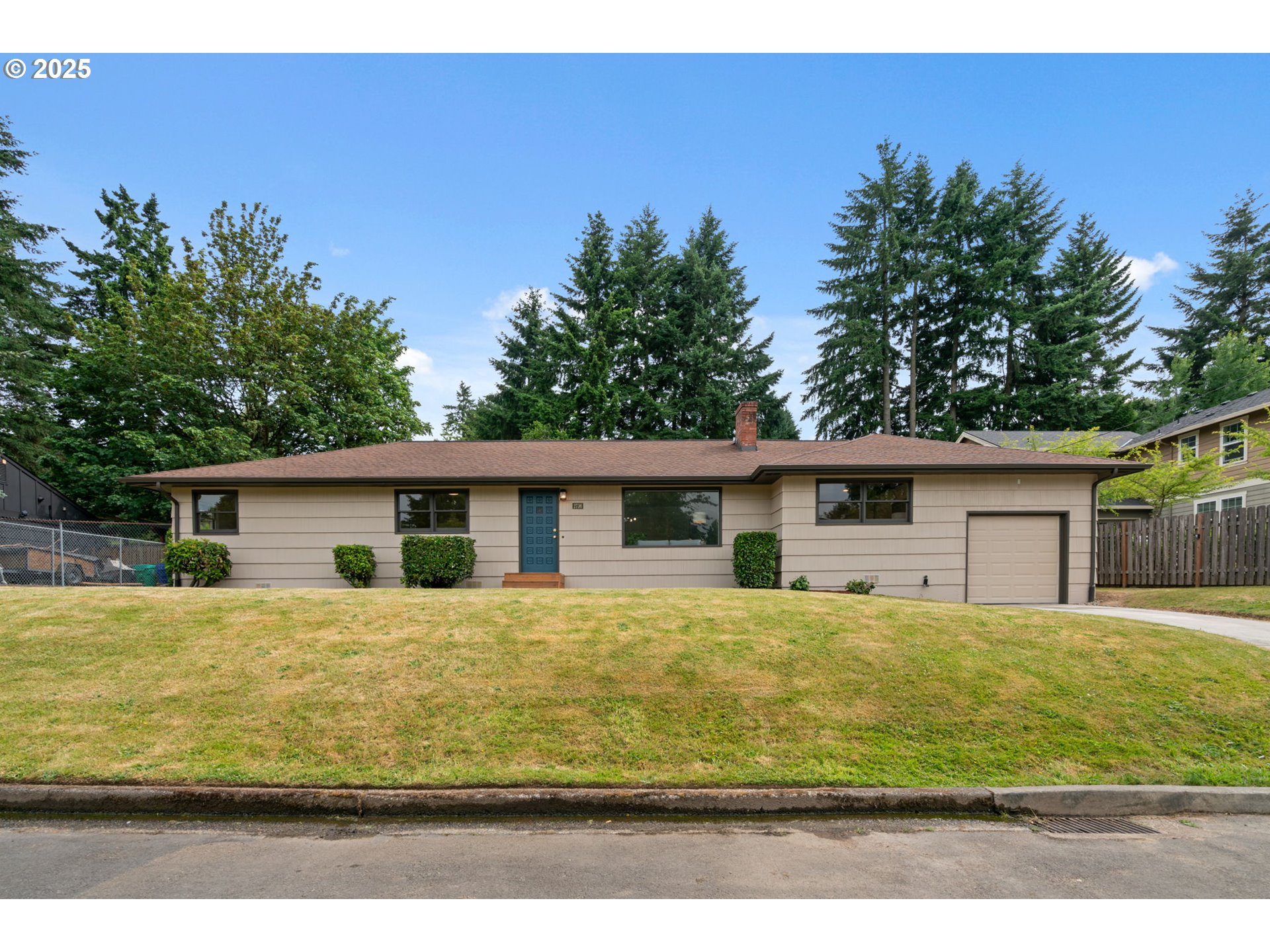 Completely updated pristine one-level ranch with serene surroundings and an unbeatable location. A brand new sparkling remodel highlights the home’s original mid-century character. Sophisticated entryway features a custom stone wall that leads into the bright living room centered by a large picture window and welcoming white fireplace. Formal dining room just off the updated eat-in kitchen with new gleaming quartz counters, tile back splash, and stainless steel appliances, including a 36" Forno induction range. Work from home or write your novel in the nice-sized office/den with beautiful natural wood beamed ceiling. All three comfortable bedrooms on one floor. Both bathrooms fully redone and include stunning tiled showers. Keep the gorgeous wood floors clean and kick off your shoes in one of two tidy mudrooms. Enjoy languid summer evenings in the huge tiered backyard with patio and lovely landscaping. All of this just a block from highly-rated Stephenson Elementary School, near multiple natural areas, Lake Oswego, with easy proximity to I-5. [Home Energy Score = 4. HES Report at https://rpt.greenbuildingregistry.com/hes/OR10239124]