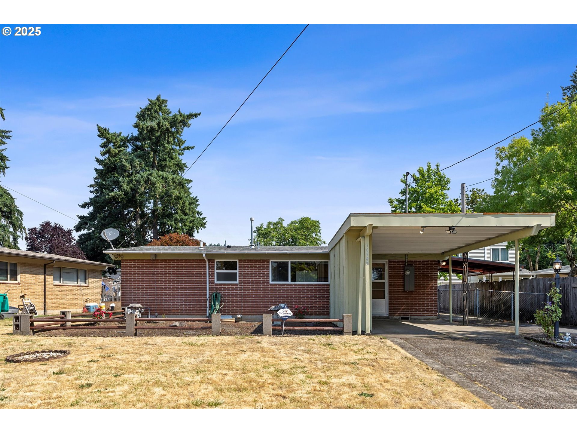 Mid Modern Century Ranch, 3 brd., 1 bath on a .21 acre lot in the Lents neighborhood.  RM1 zoned (additional building possibilities) This well-maintained home has great bones, brick siding, wood burning fireplace and A/C.  Just needing some cosmetic updates to make it yours.  Believed to have beautiful hardwoods under carpets, all vinyl windows, newer roof, newer heat pump and alarm system.  All appliances will stay.  The flat large fenced backyard has two sheds - A Tuff shed 8'x8' and 12'x9' with electrical for your tools and hobbies.  RV Parking.  Located near end of road on dead end street.  Per county, property is zoned RM1 (multi-dwelling zone) ADU, Duplexes, etc.  Please do your own due diligence on zoning.  Open House Saturday 6/28  11:00 - 2:00(the freezer under the carport has been removed and not part of the home sale)