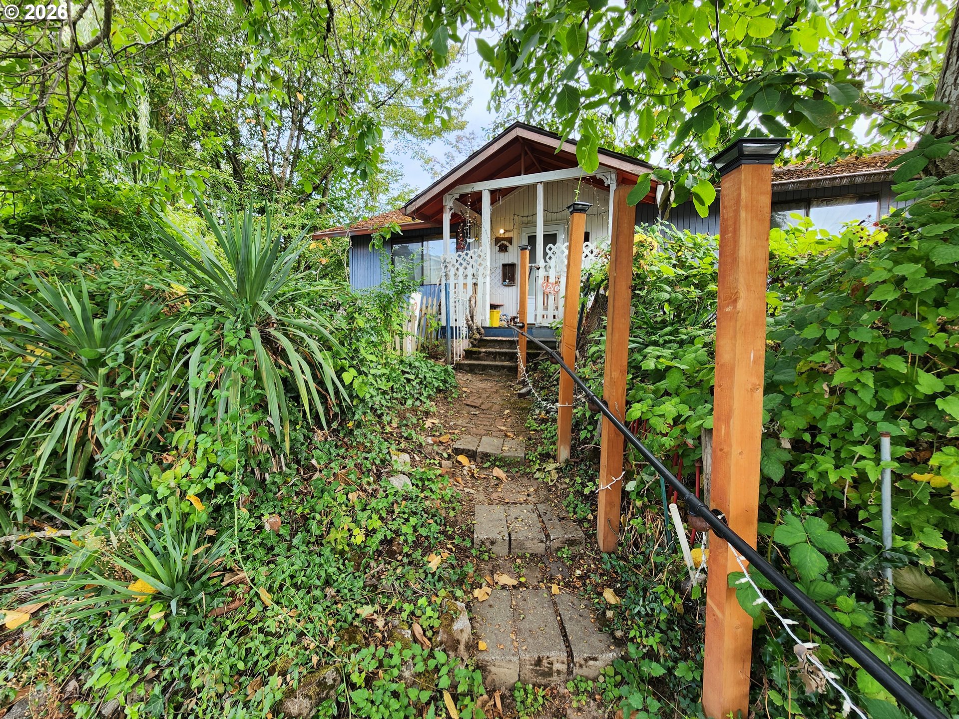 NE PDX fixer on a 6,500 sqft corner lot. This 2BR, 1BA home needs your vision and skills to make this one shine again. Large yard with 2 Tuff Sheds for extra storage. Lot line is approximately where the original driveway pour break is located. [Home Energy Score = 5. HES Report at https://rpt.greenbuildingregistry.com/hes/OR10251859]