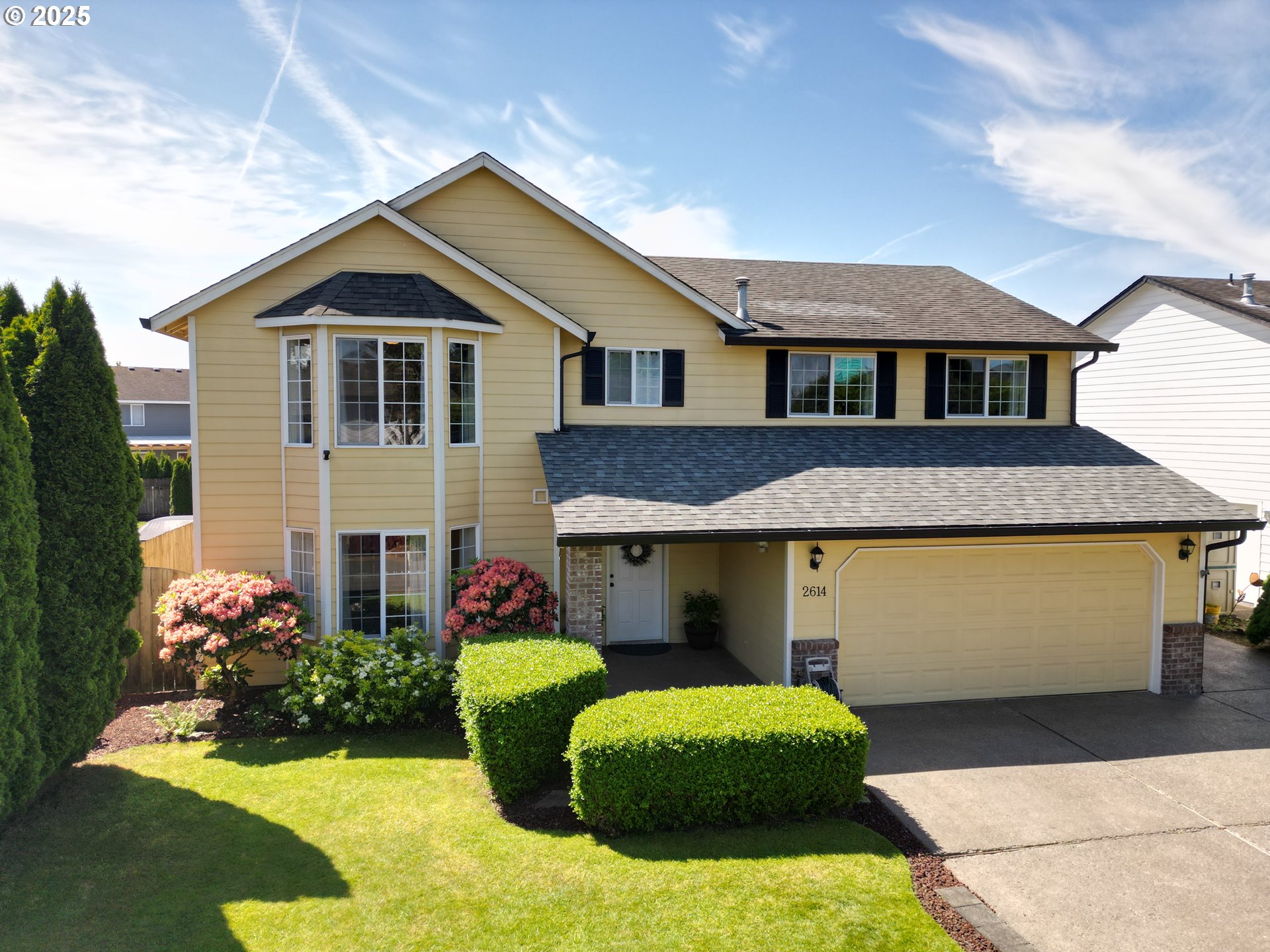 Welcome to this beautifully updated 2-story Craftsman tucked away on a private drive in the community of Royal Greens. It beautifully collides with Maple Crest for Shared enjoyment. With tree-lined streets, wide sidewalks, and several community parks, this area offers a warm and connected feel that’s hard to beat.Step inside and you'll immediately notice the bright and airy atmosphere, enhanced by fresh interior paint, large windows, and thoughtfully selected finishes. Luxury plank flooring flows throughout most of the home, including the spacious living areas and upstairs bedrooms. The newly remodeled kitchen is a standout, featuring granite countertops, stainless steel appliances, and tile flooring—perfectly positioned between the cozy family room and formal dining space. Enjoy multiple living areas including a separate living room and a sunny breakfast nook that make daily living and entertaining effortless. Upstairs, the spacious primary suite offers a retreat-like feel with its double-door entry, bay window, and ensuite bathroom. The ensuite features a beautifully tiled step-in shower, granite vanity, and slate tile floors. Two additional bedrooms and a large bonus room with built-in cabinetry provide plenty of flexibility—ideal for an entertainment space, home office, or additional bedrooms if needed.Outside, the property is bursting with curb appeal—lush landscaping, mature trees, flowering plants, and a concrete patio perfect for relaxing or entertaining. A fully finished detached shop with 220V power offers a great space for projects, hobbies, or future possibilities like an ADU. This home combines stylish updates, versatile spaces, and a prime Eastside location that truly checks all the boxes.