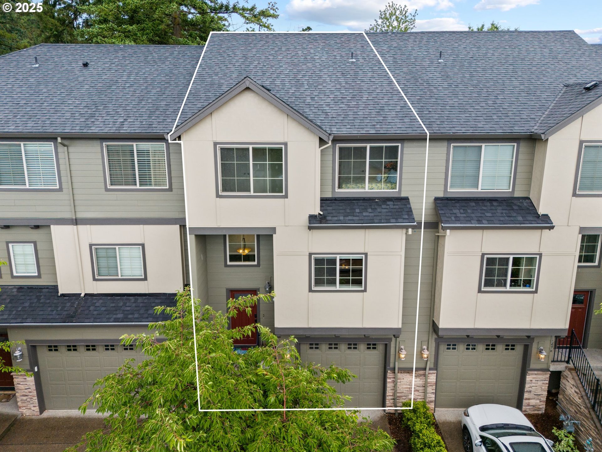 Calling all golf lovers! This lovely tri-level contemporary townhome sits right on Eagle Landing Golf Course and offers the perfect blend of comfort, convenience, and style. Enjoy all the amenities inside and out—from engineered hardwood floors and central A/C to a central vacuum system and two private decks shaded by mature trees.Step inside to an open-concept main floor with a breezy layout, 9-foot ceilings, and large windows that flood the space with natural light. The eat-in kitchen is designed for both function and style, featuring a gas range, stainless steel appliances, built-in microwave, dishwasher, and a dedicated dining area that flows effortlessly to your patio—ideal for morning coffee or evening entertaining.Upstairs, all three bedrooms are located near the laundry room (washer & dryer included!) for easy living. The spacious primary suite includes a walk-in closet and a luxurious ensuite bath with a new soaking tub (2024), dual sinks, tile floors, and a walk-in shower. Additional updates include a sump pump installed in 2021 and an extra-deep one-car garage with ample storage.This home is truly move-in ready and located in one of Happy Valley’s most livable communities—just steps from Mt. Scott Elementary, minutes to I-205, Costco, Walmart, and local parks. The HOA at Eagle Landing covers front and back landscaping, exterior paint, common area maintenance, and includes access to golf course amenities.Timeless design meets everyday function in this one-of-a-kind Happy Valley gem. Don’t miss your chance—schedule your private showing today!